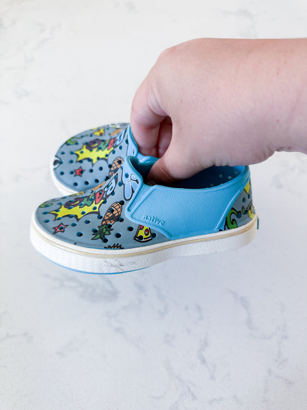 Natives- 7C- GUC- slip ons with comic graphics