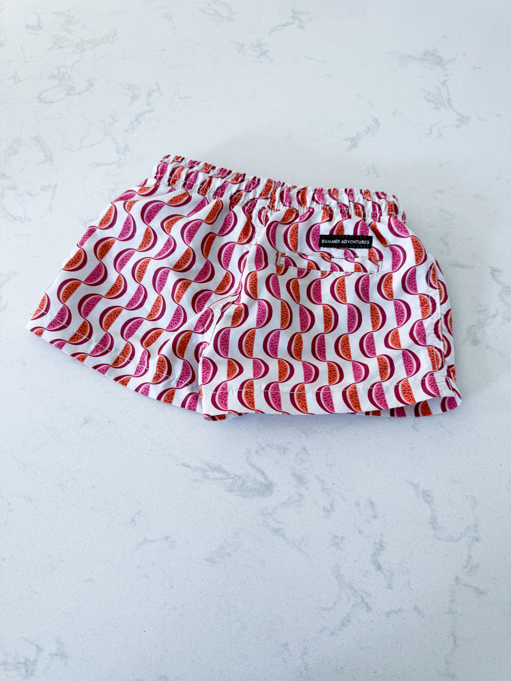 Zara- fits 2-3Y- VGUC- white swim trunks with orange and pink fruit slices