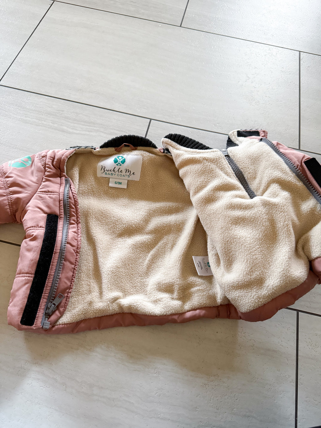 Buckle Me- 6-9m- VGUC- light pink car seat coat