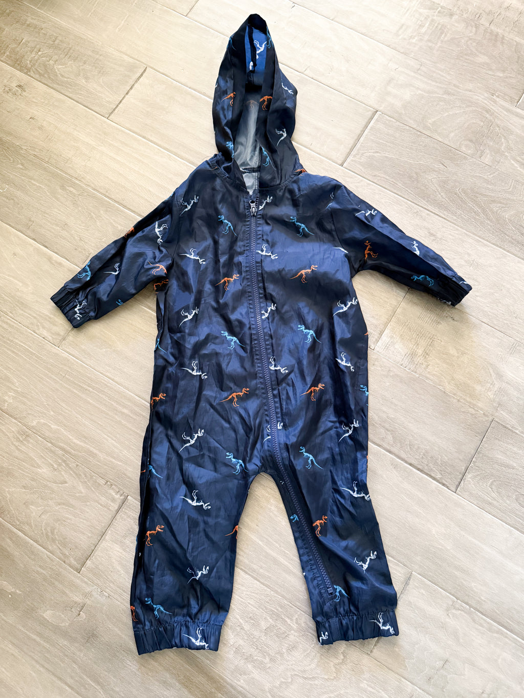 George- 2T- VGUC- navy blue thin splash suit with dino pattern