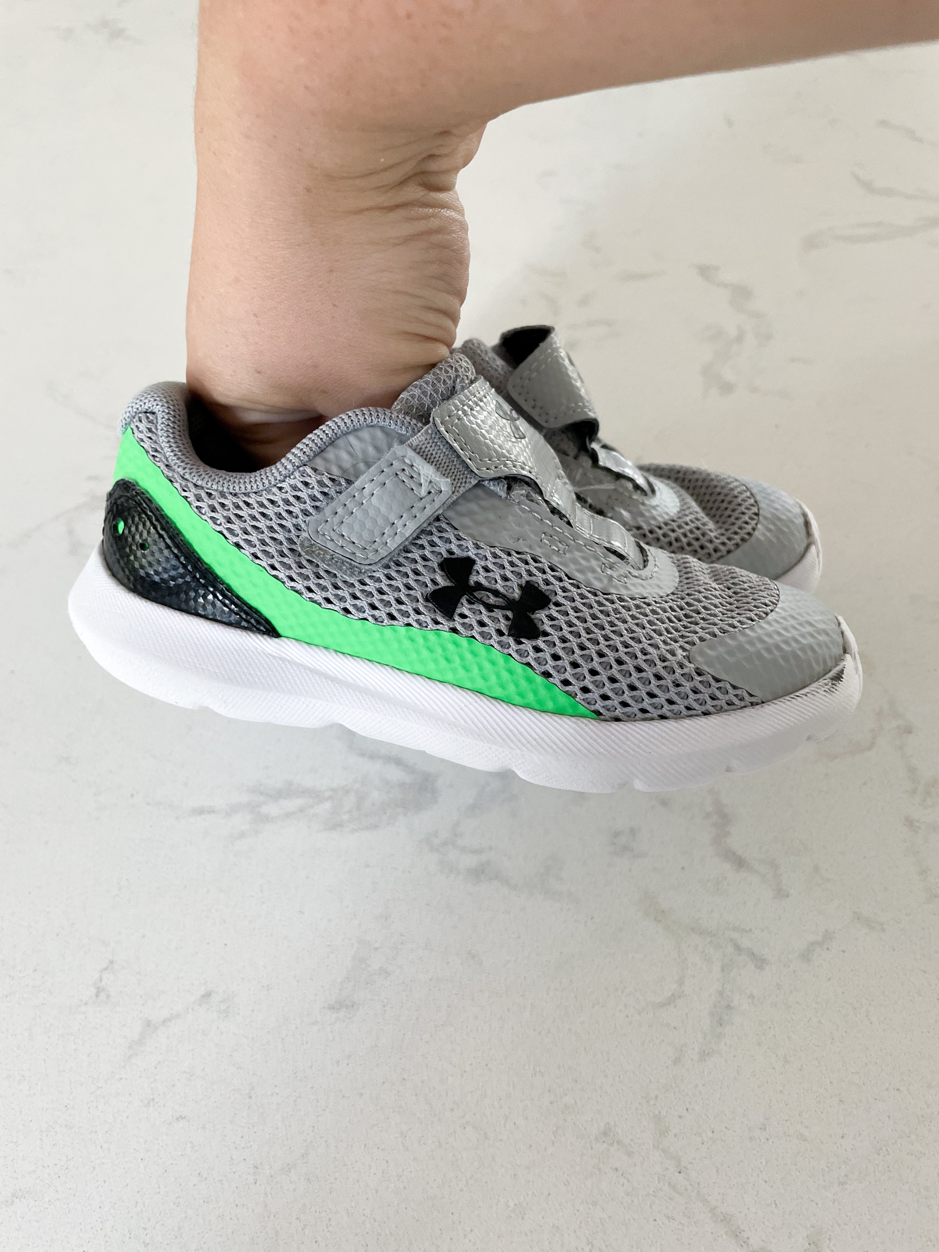 Under Armour- 9C- grey shoes with green and black
