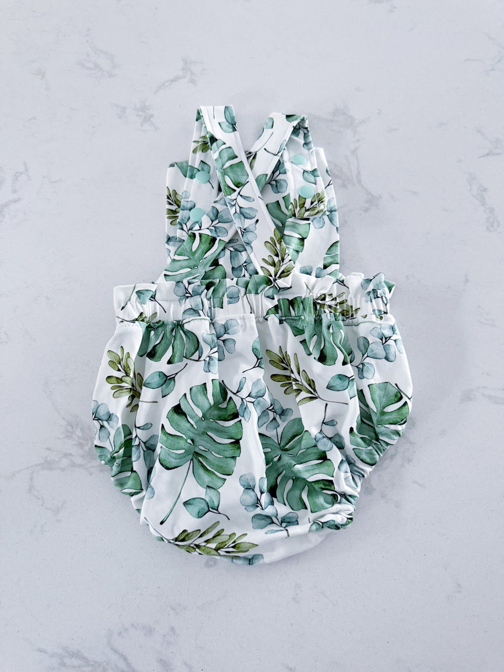 J’s- 3-6m- EUC- small-shop bubble romper overall style with tropical leaves