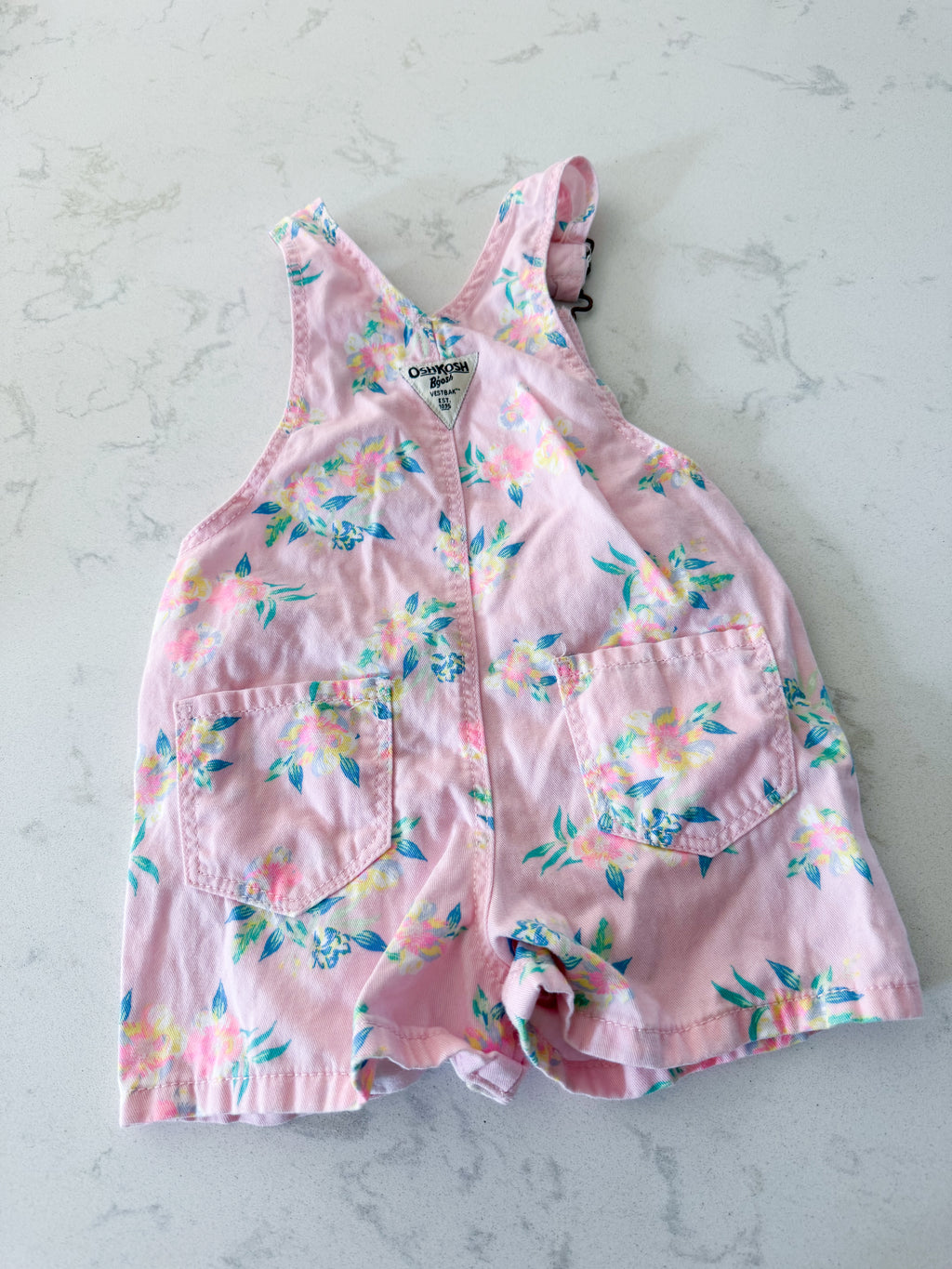 Oshkosh- 2T- VGUC- light pink short overalls with bright florals