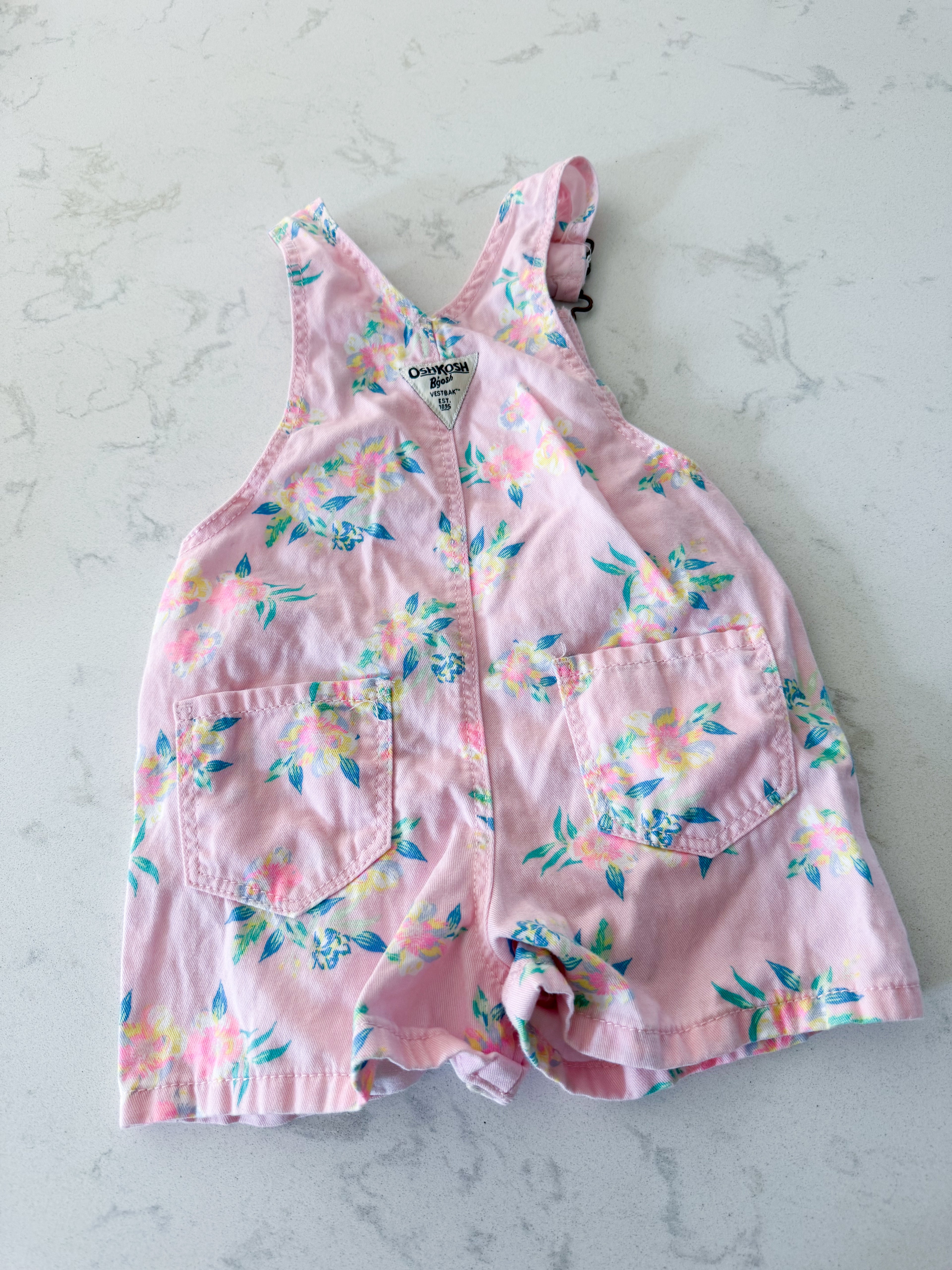 Oshkosh- 2T- VGUC- light pink short overalls with bright florals