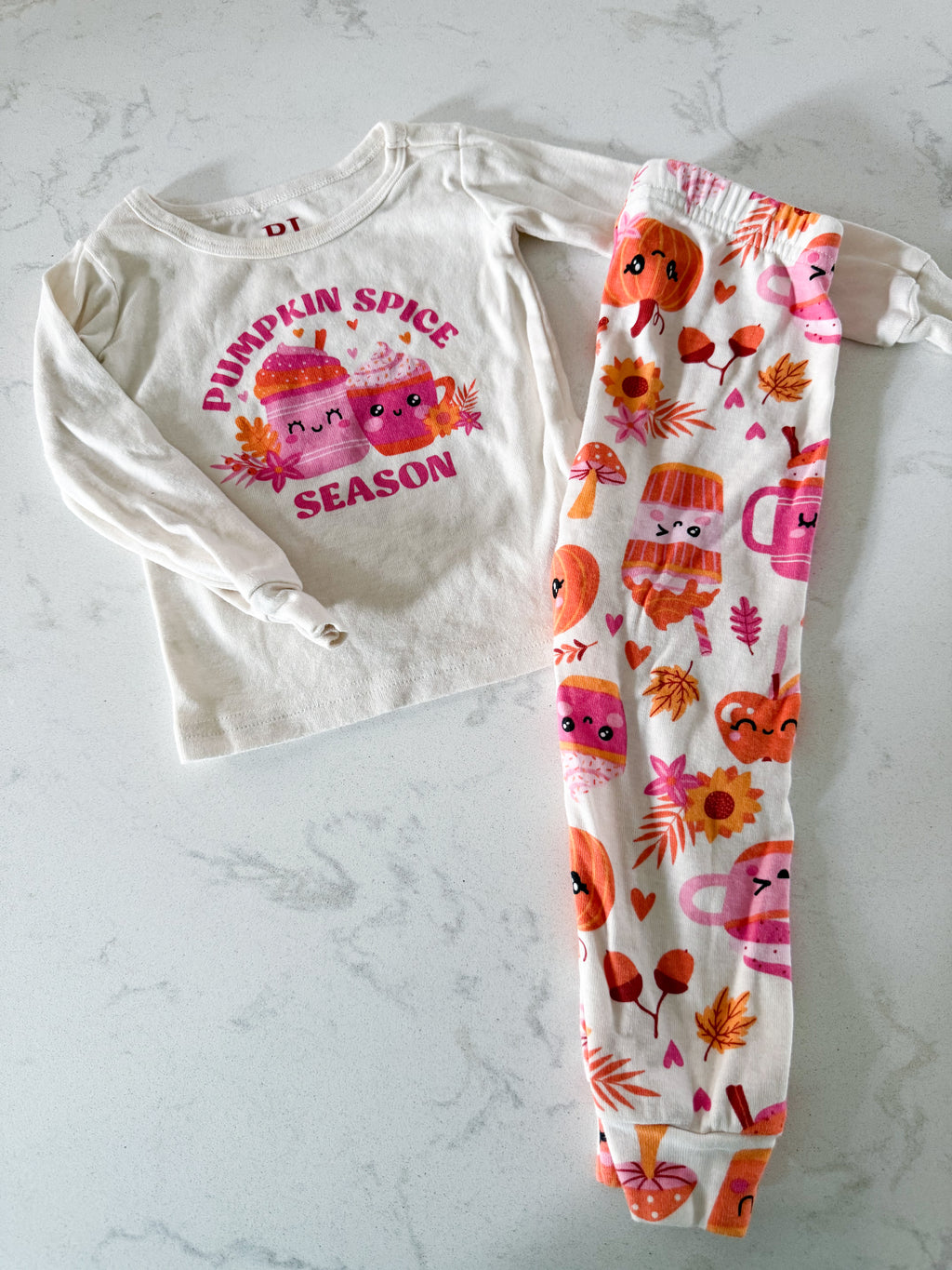 The Children’s Place- 9-12m- PLAY- long sleeve white jammies with pink and orange pumpkin spice pattern
