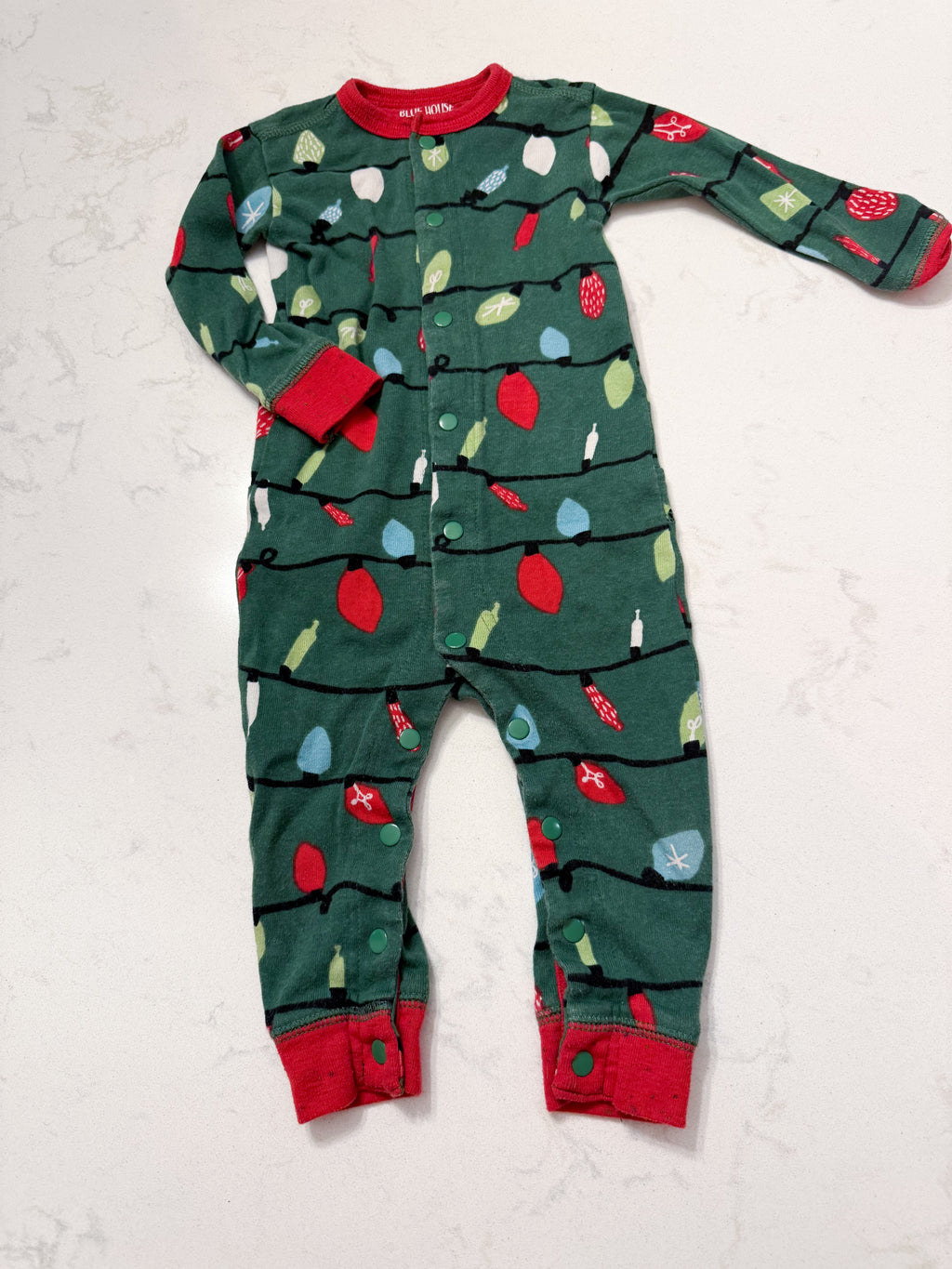 Little Blue House- 12-18m- GUC- green footless pajamas with patch on bum and Christmas light pattern