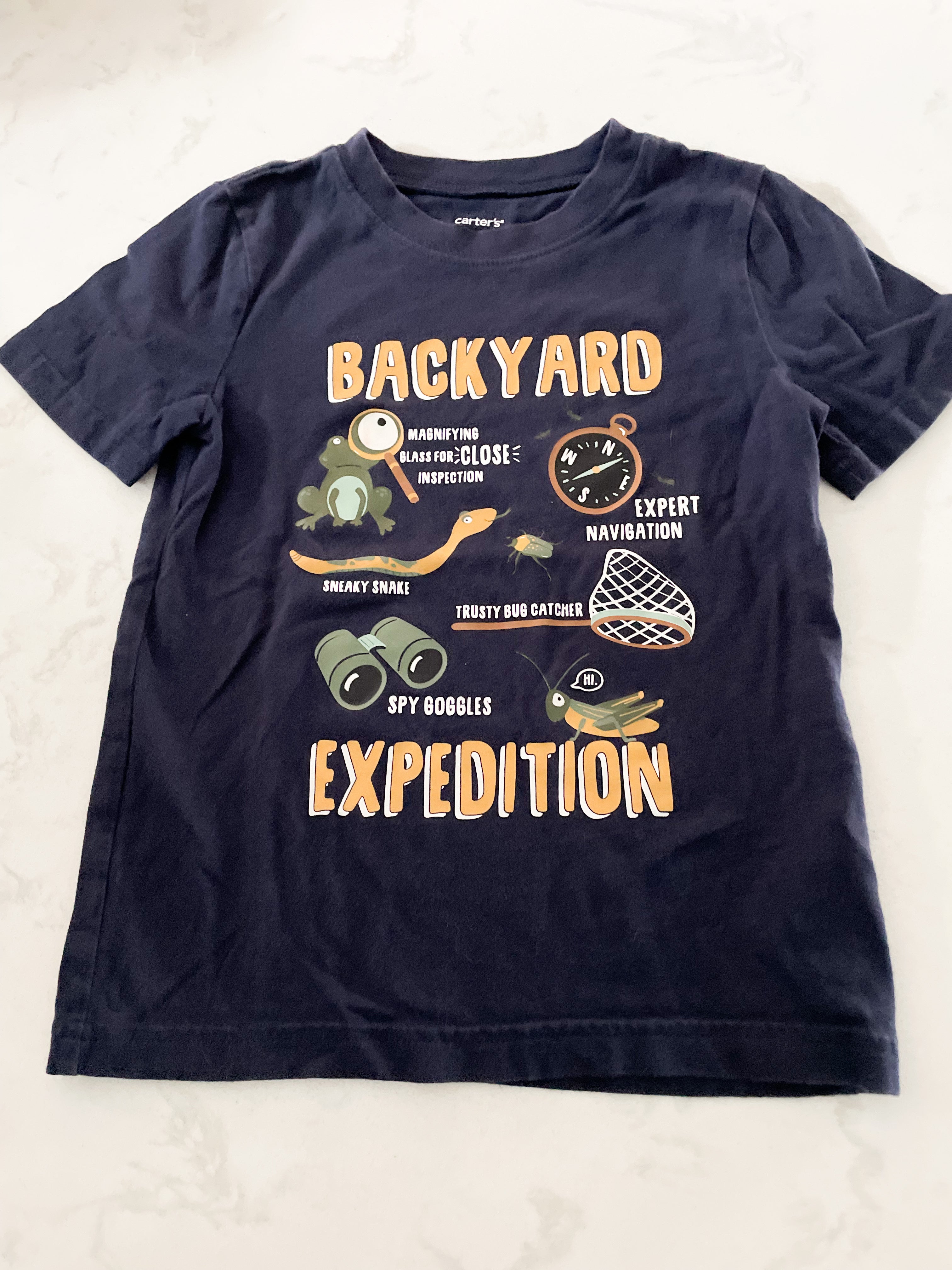 Carter’s- 5T- GUC- navy blue t-shirt backyard expedition