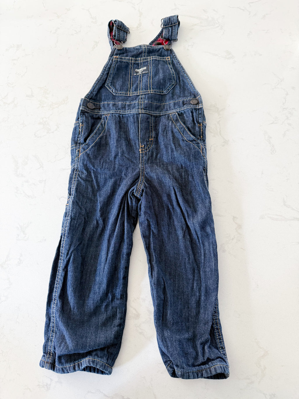 Oshkosh- 3T- GUC- jean overalls with red and black checkered lining