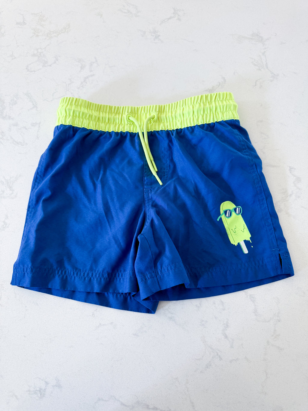 Old Navy- 6-7Y- VGUC- blue and neon green swim trunks with popsicle