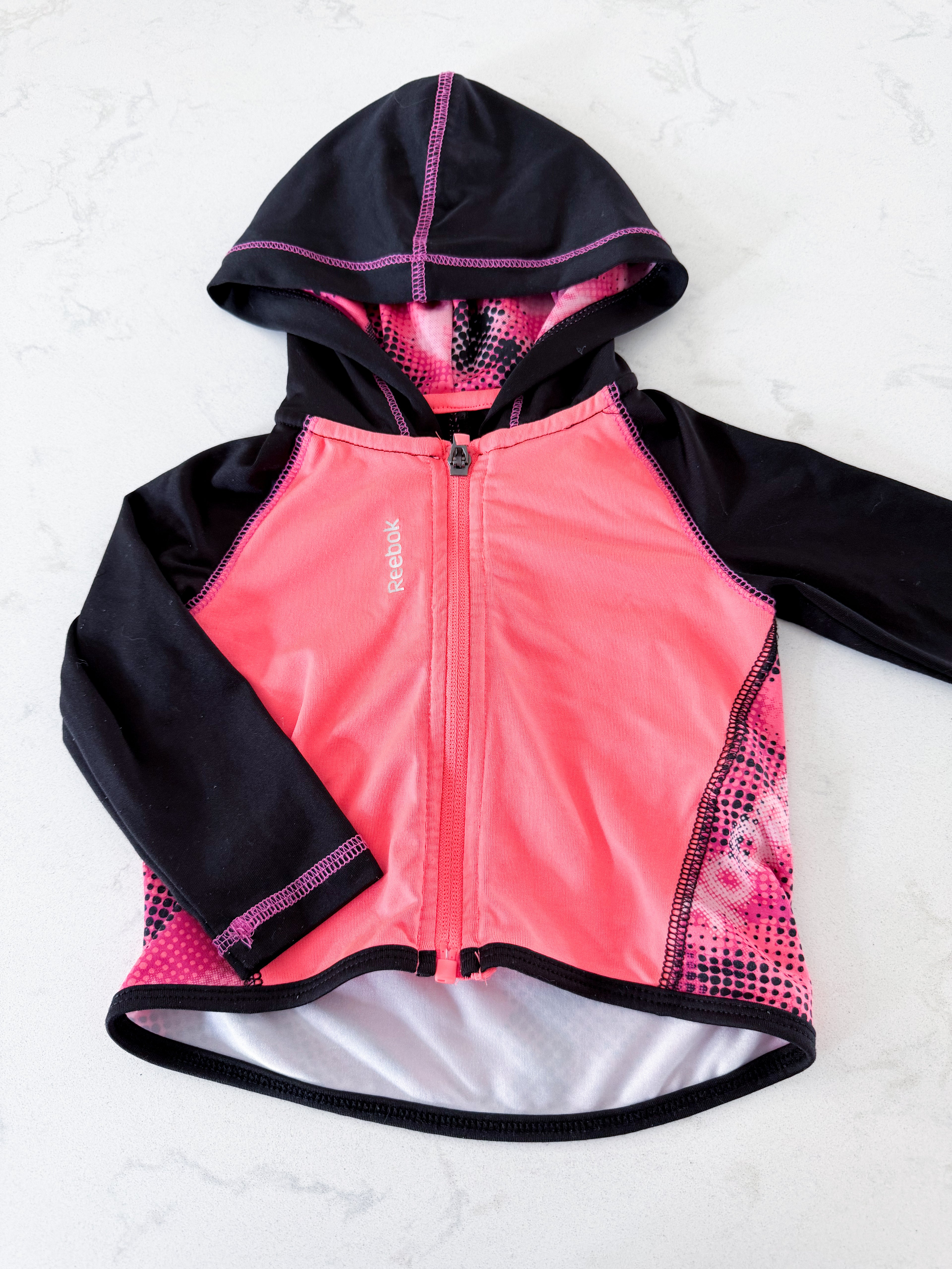 Reebok- 12m- GUC- neon pink zip up athletic hoodie with pink pattern