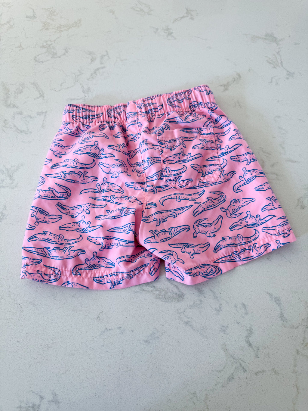 Old Navy- 2T- VGUC- pink swim trunks with blue crocodiles