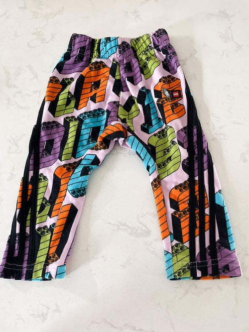 Adidas x Lego collection- 12-18m-VGUC- light purple sweatpants with Lego pieces