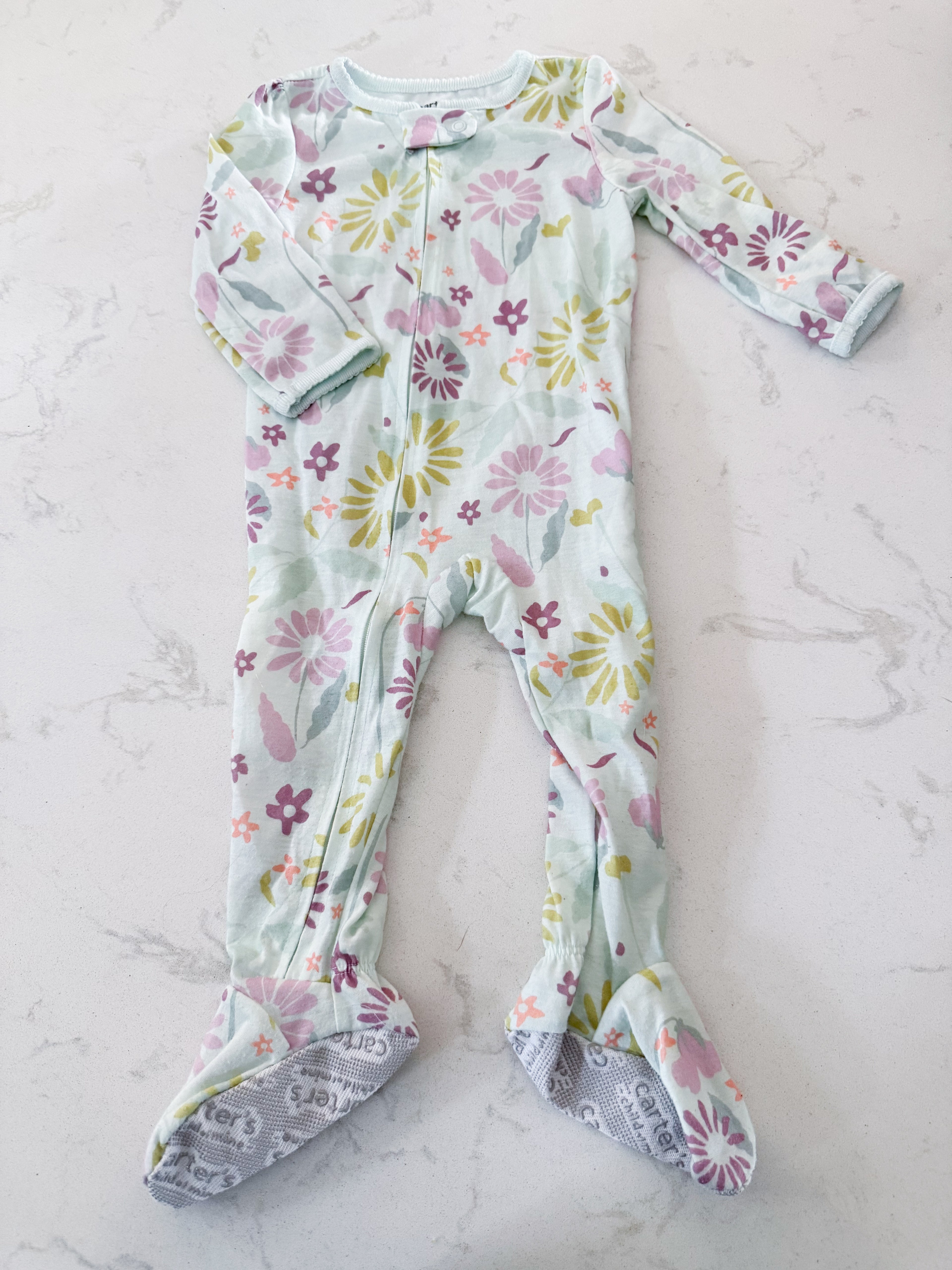 Carters- 12m- VGUC- green-blue with purple florals footie pajamas