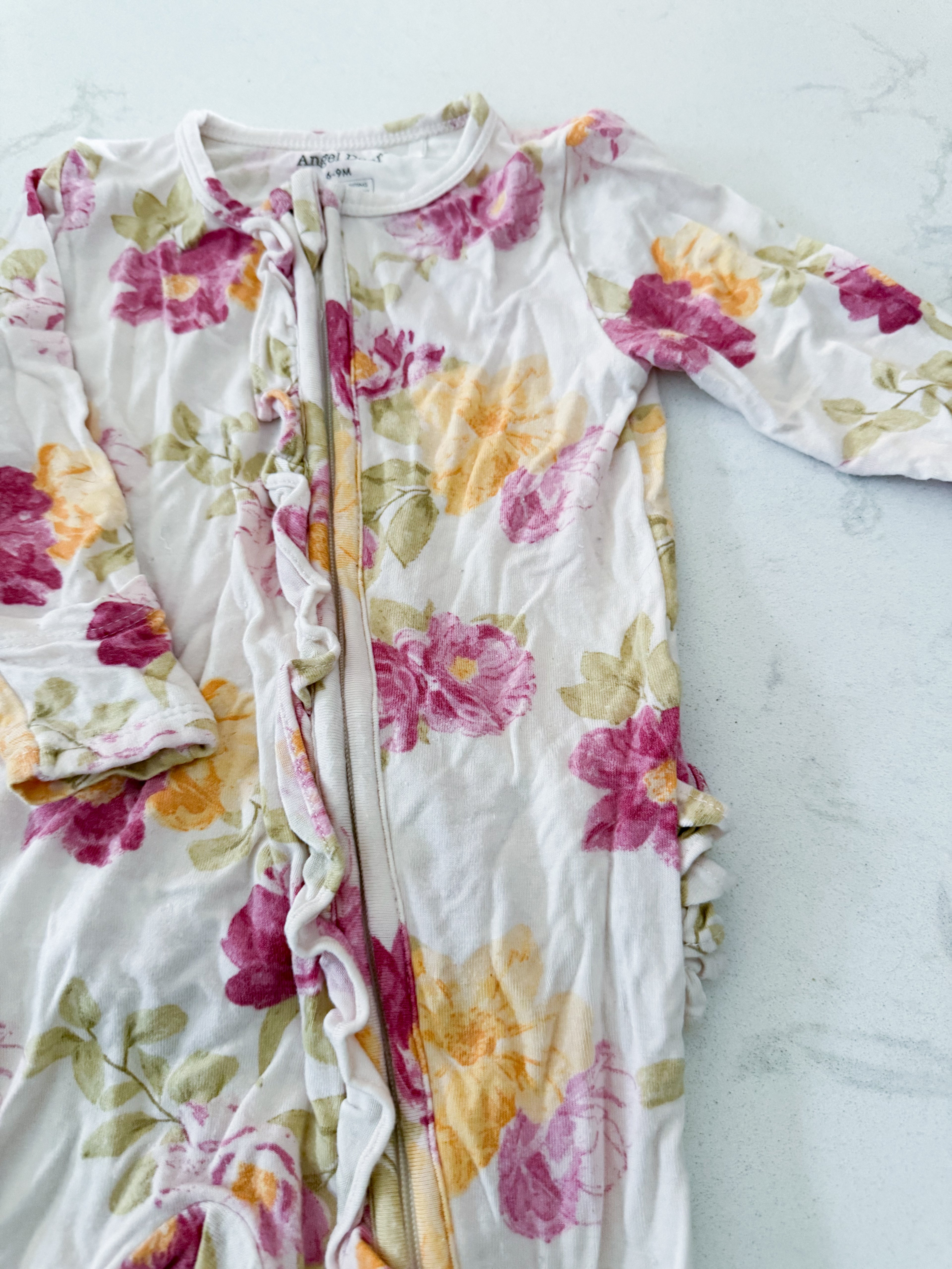 Angel Dear- 6-9m- GUC- cream coloured bamboo jammies with pink yellow florals and ruffle bum