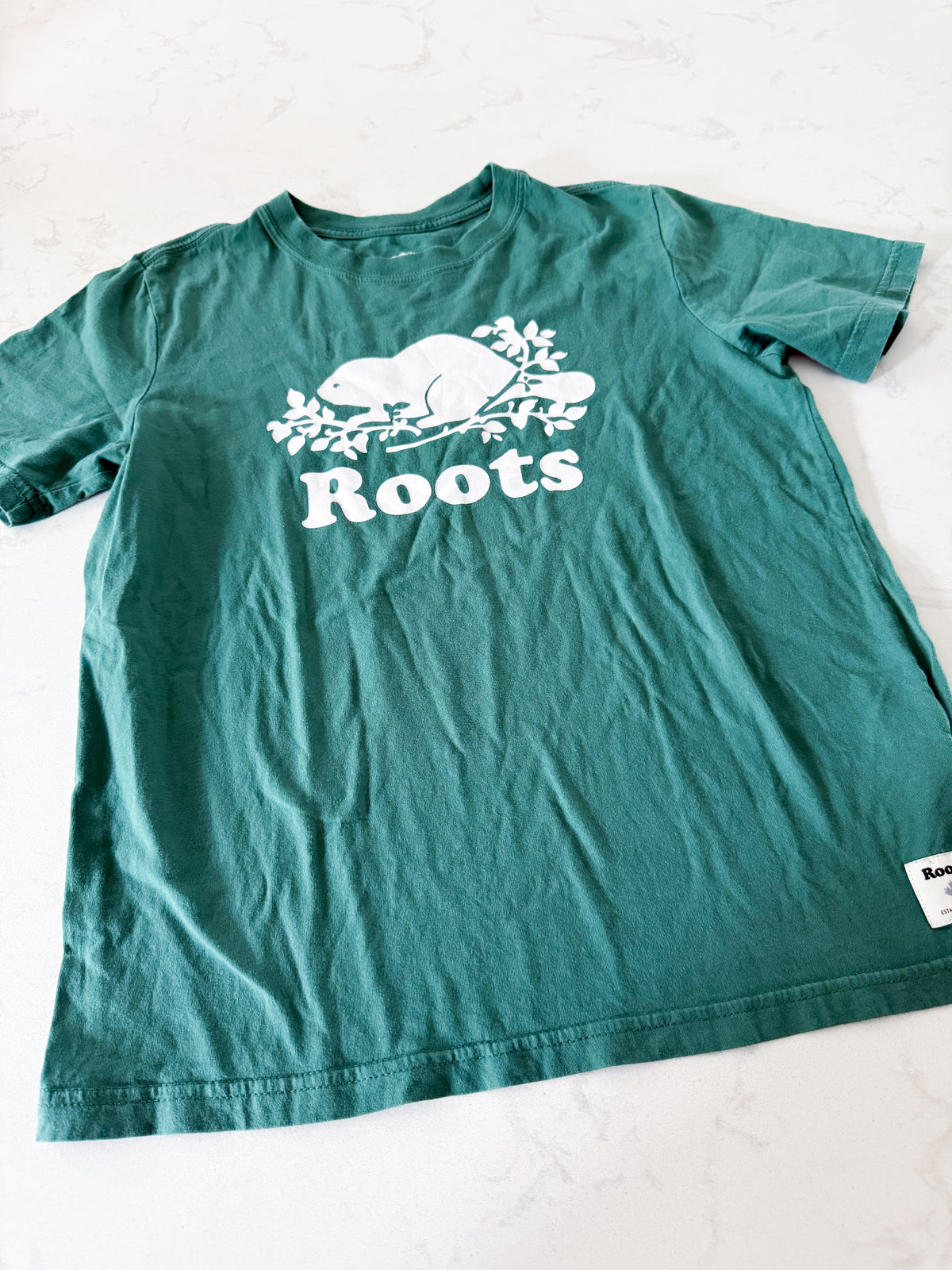 Roots- 11-12Y- GUC- Green t shirt with white logo