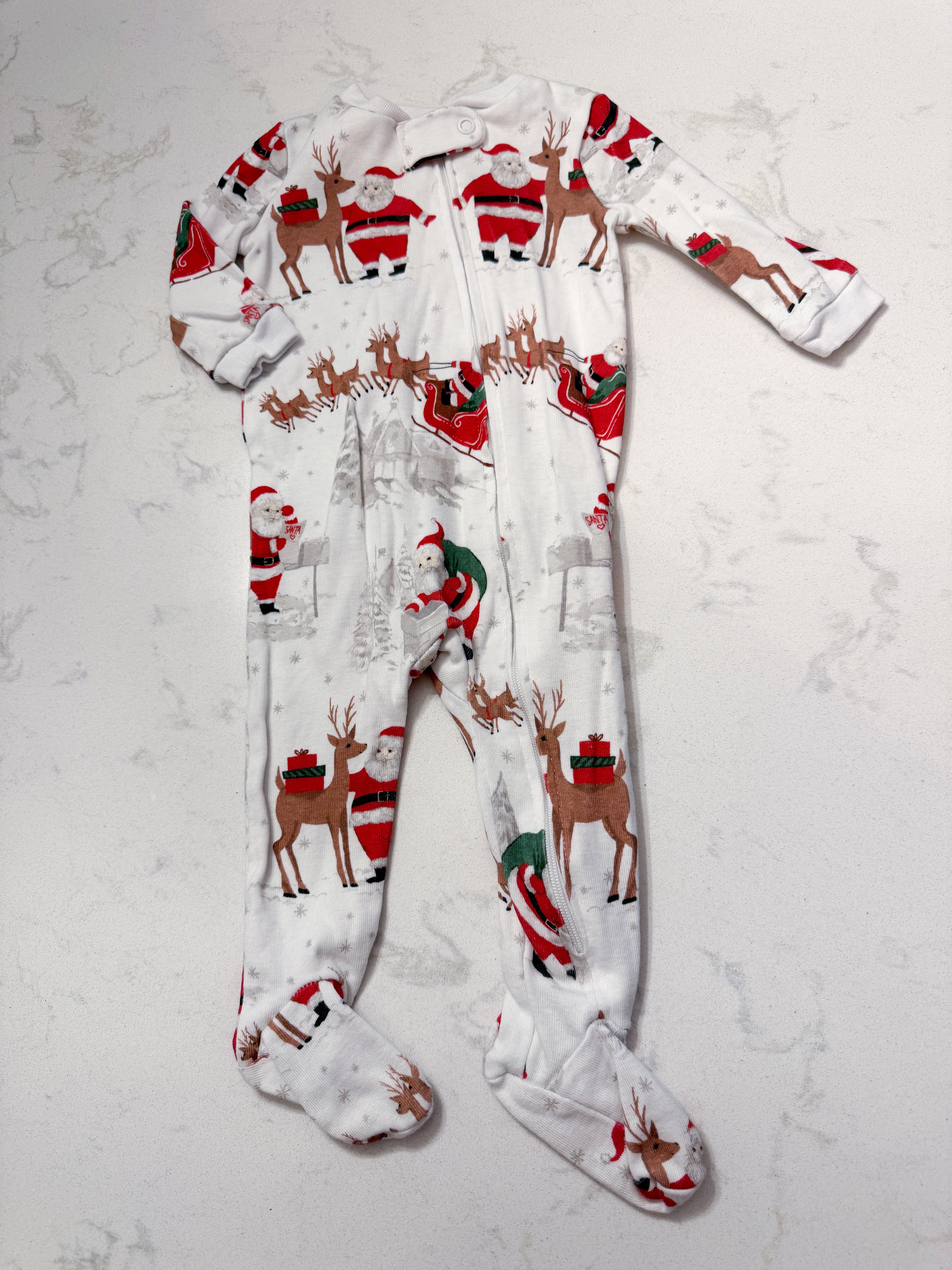 Pottery Barn Kids- 3-6m- VGUC- white zip up footie pajamas with Santa