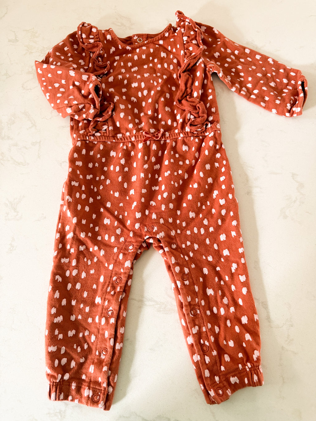 Carters- 6-12m- VGUC- rust brown romper with light pink dot pattern and ruffles