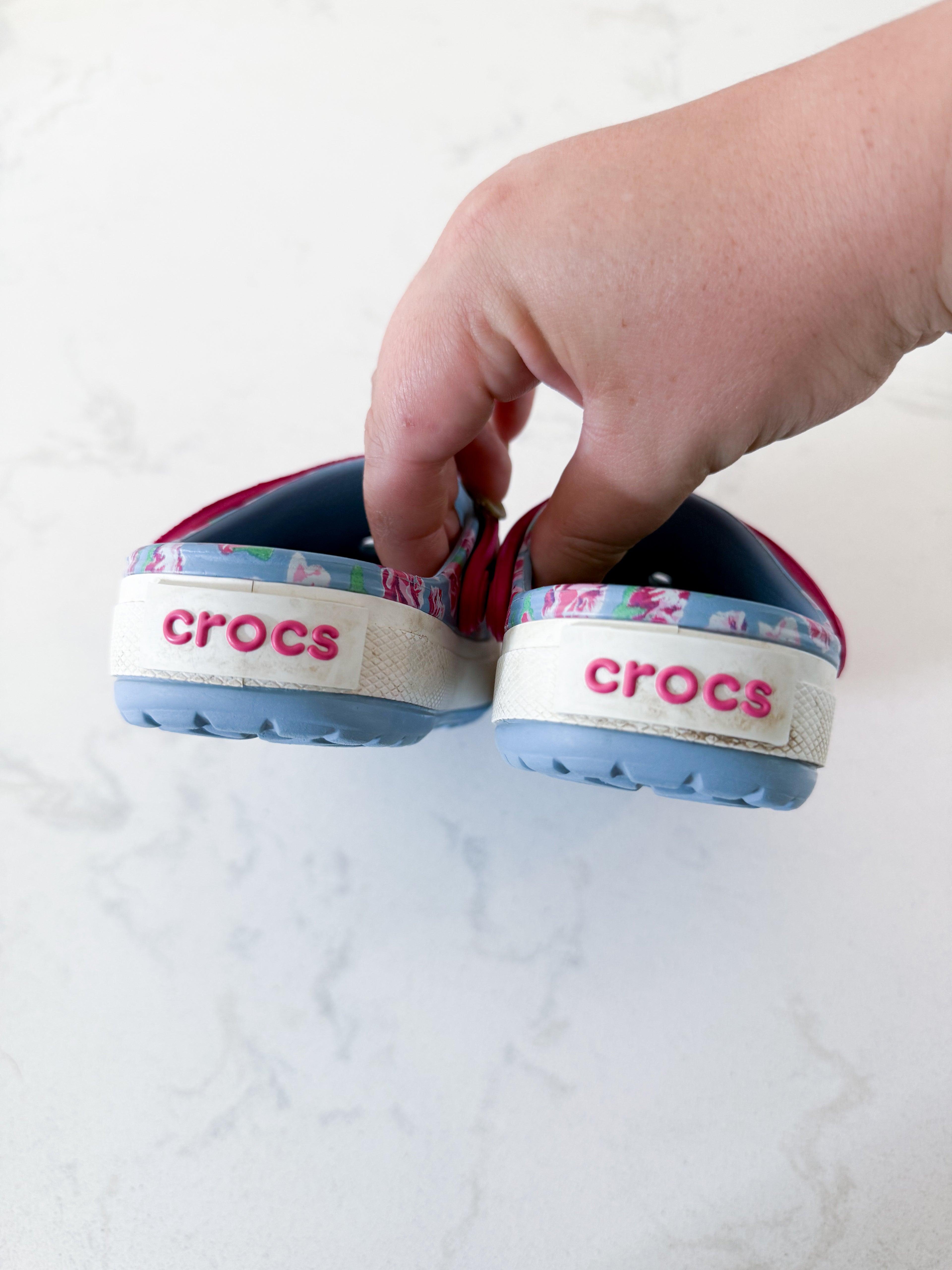 Crocs- 8/9C- GUC- light blue slip on crocs with pink florals