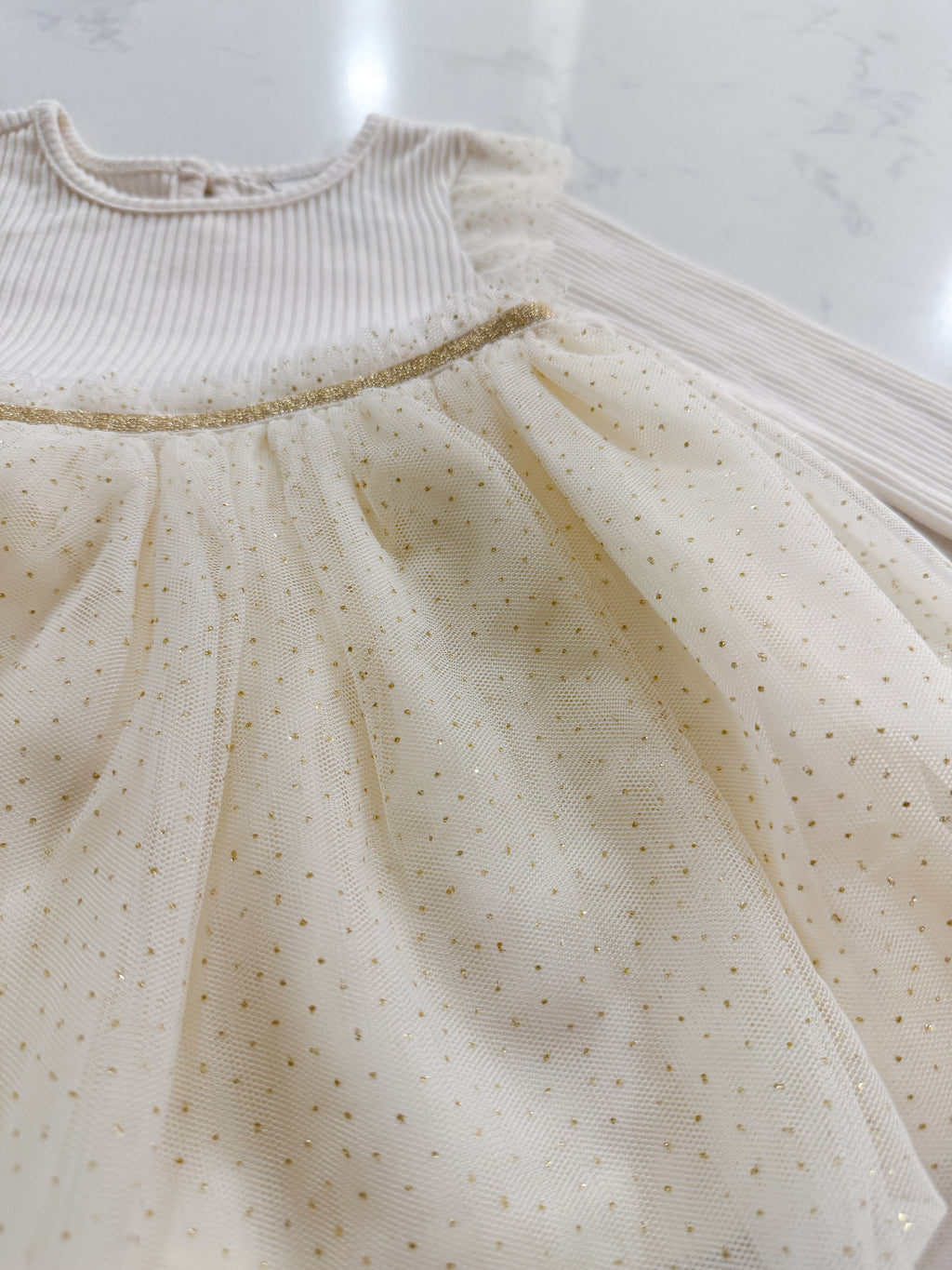 The Children’s Place- 9-12m- VGUC- long sleeve ribbed dress with gold sparkly tulle skirt
