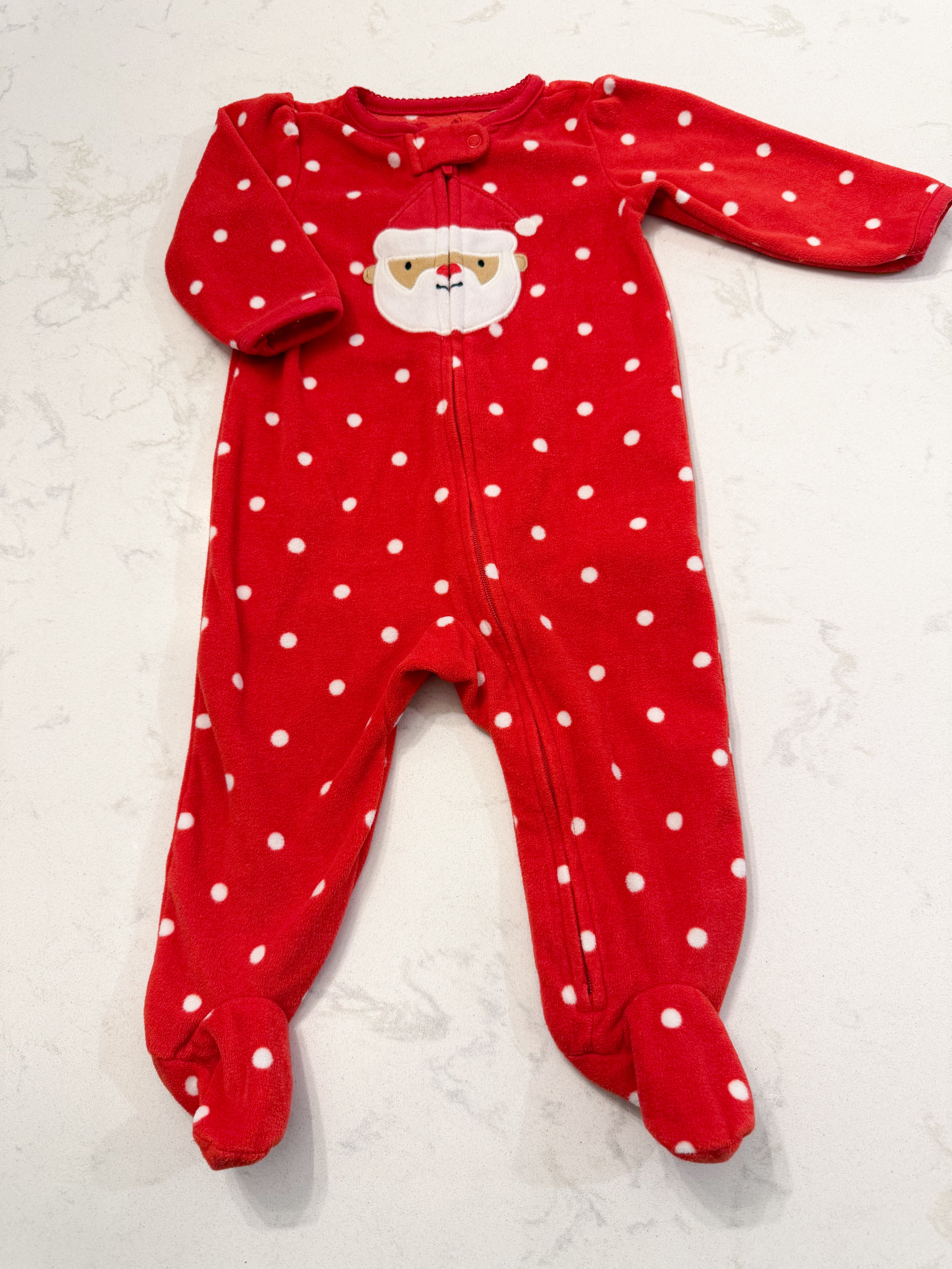 Carter’s- 3-6m- VGUC- red fuzzy footie jammies with polka dots and Santa