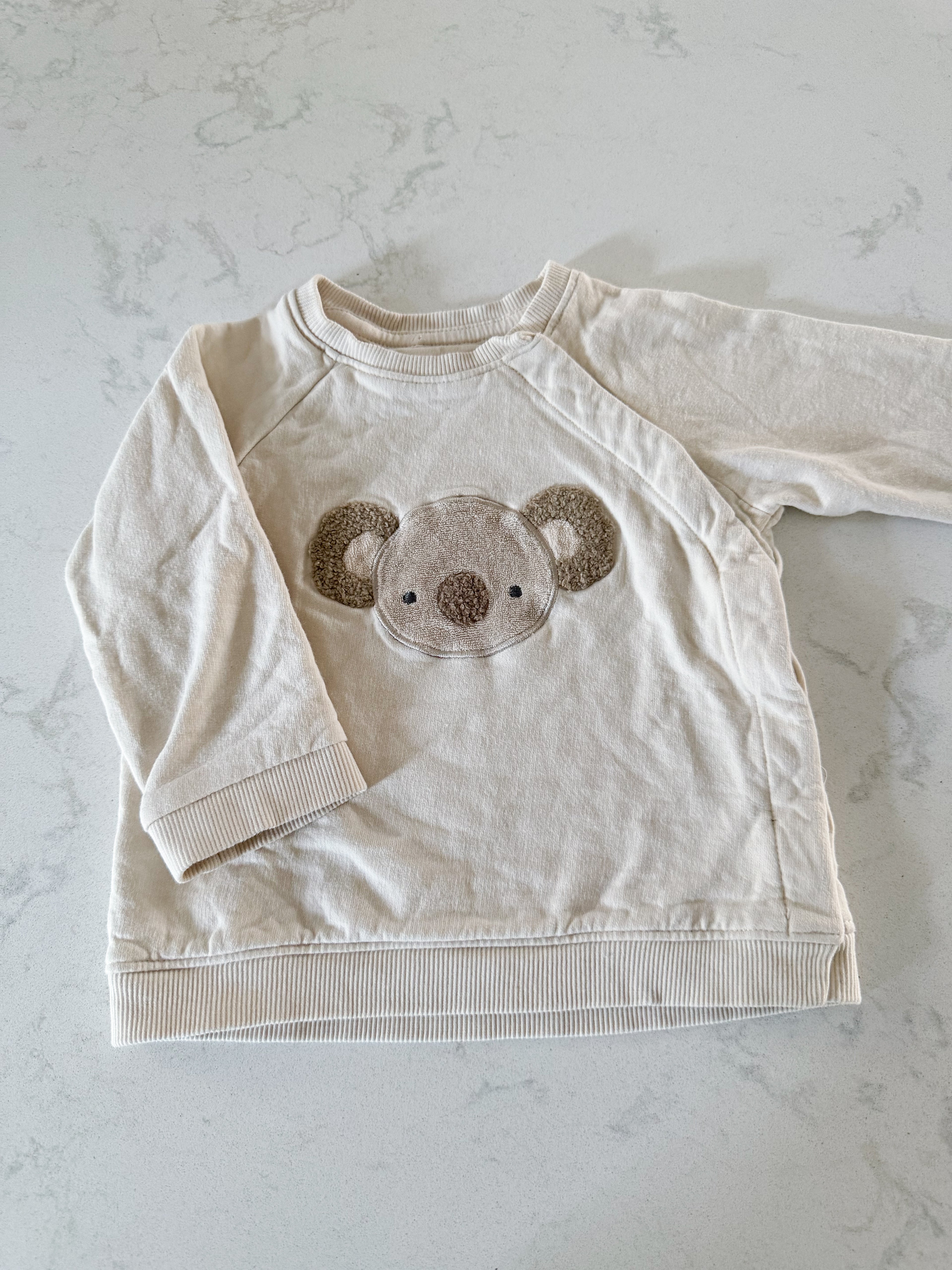 H&M- 9m- GUC- cream coloured embroidered koala crewneck