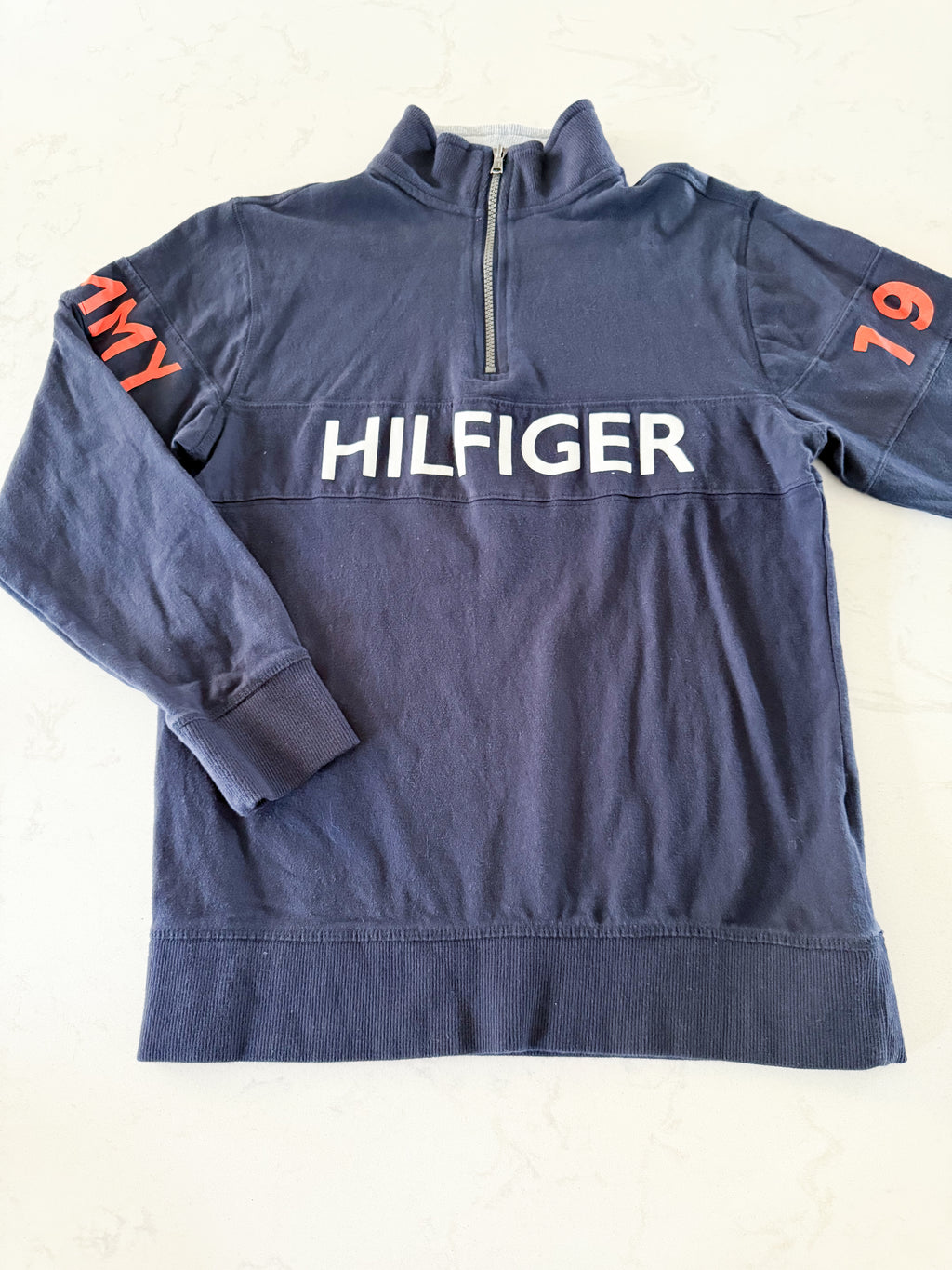 Tommy Hilfiger- 16-18Y- GUC- navy blue quarter zip with orange accents