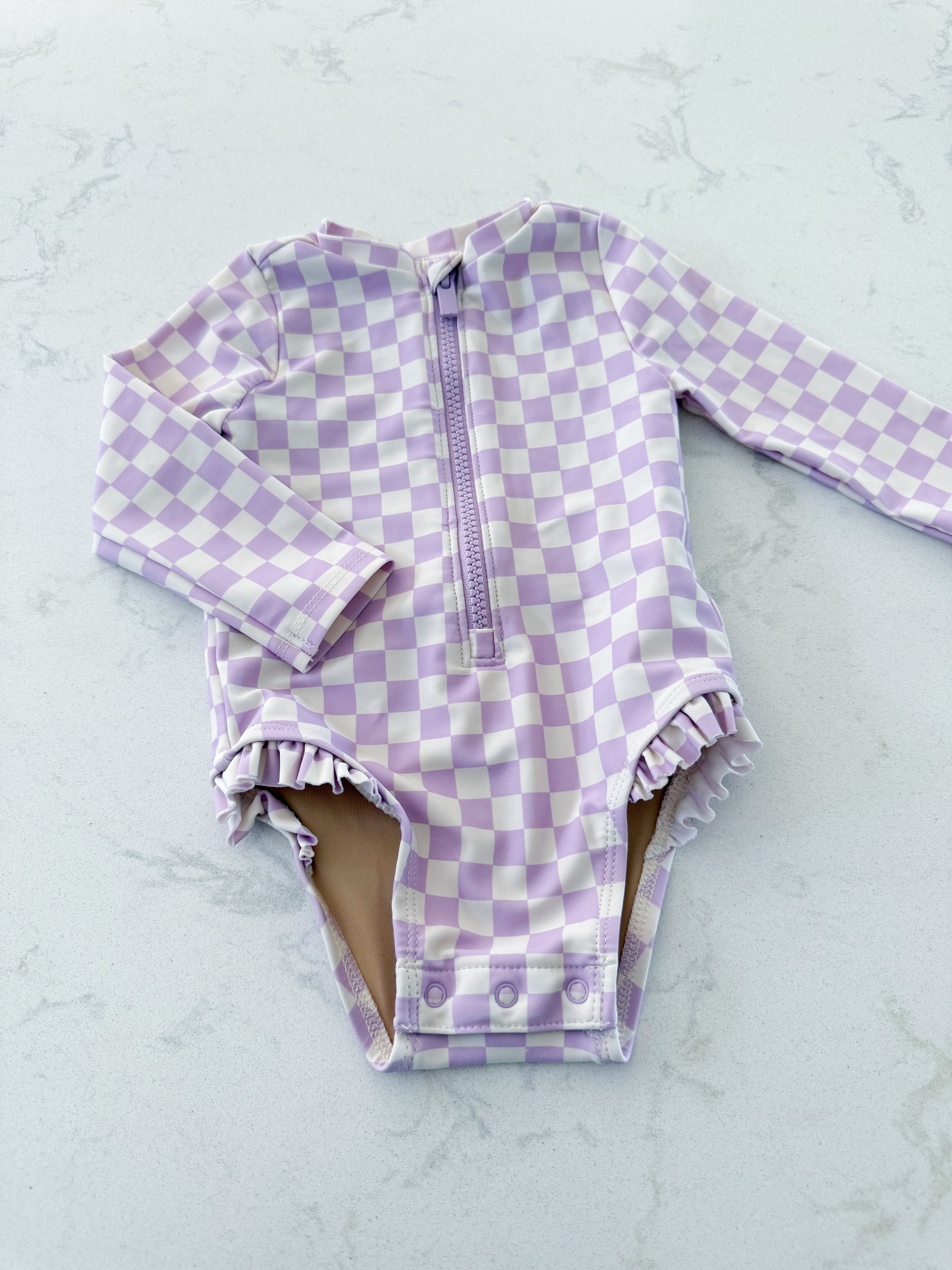 Old Navy- 6-12m- VGUC- light purple and white checkered long sleeve swim suit