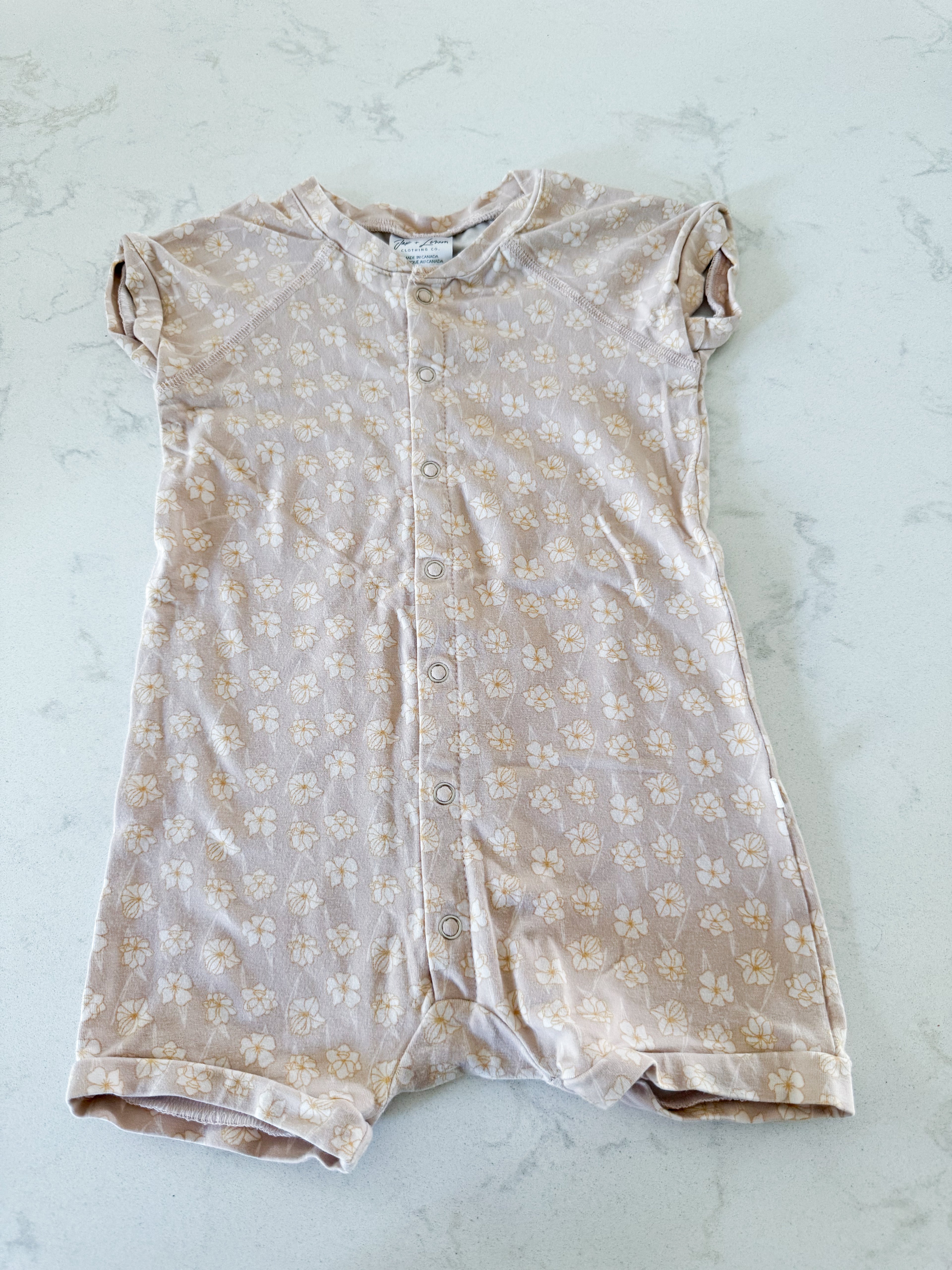 Jax and Lennon- 18-24m- VGUC- light pink with white florals short sleeve romper