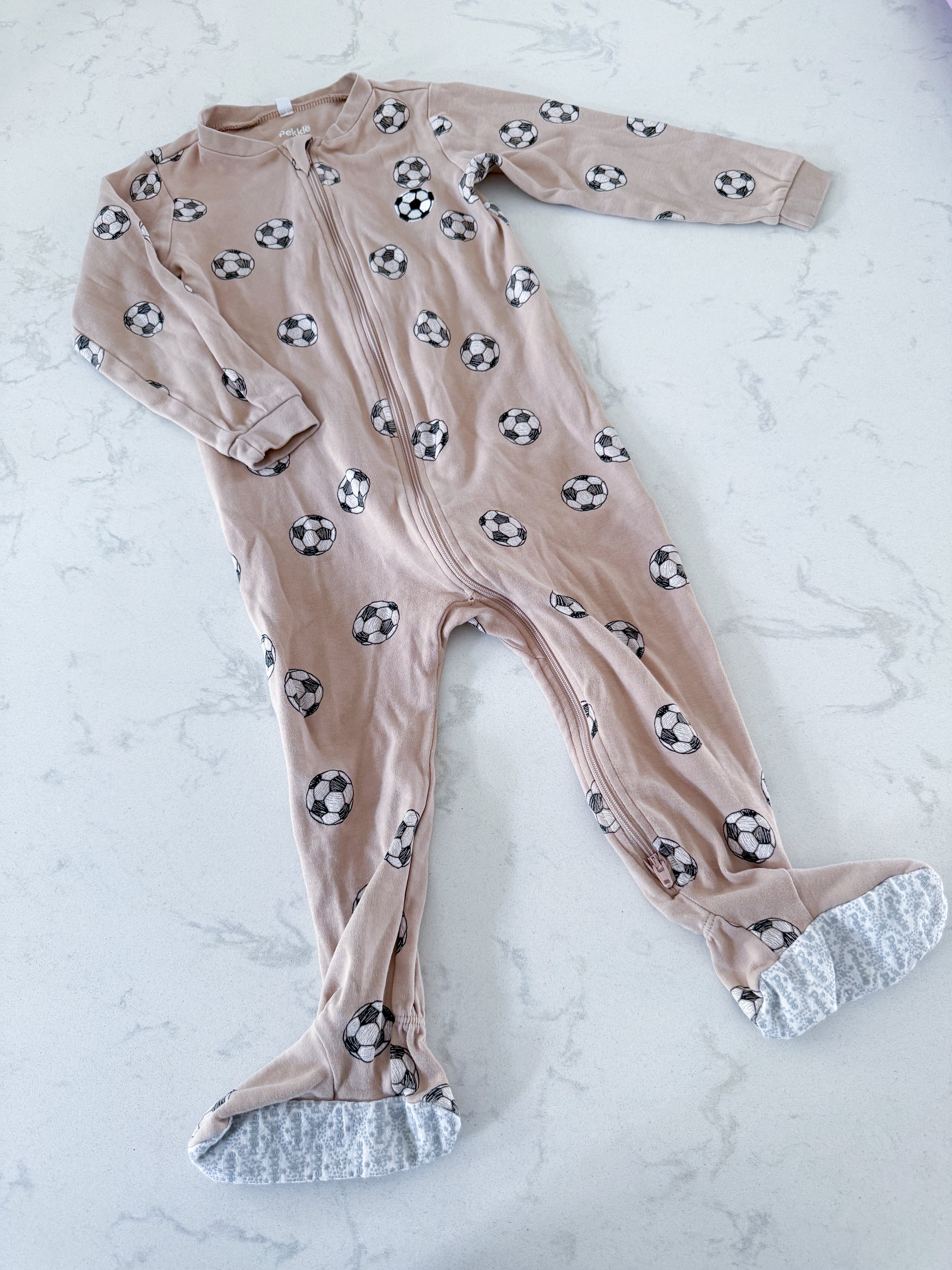 Pekkle- 24m- GUC- beige footie pajamas with embroidered soccer ball