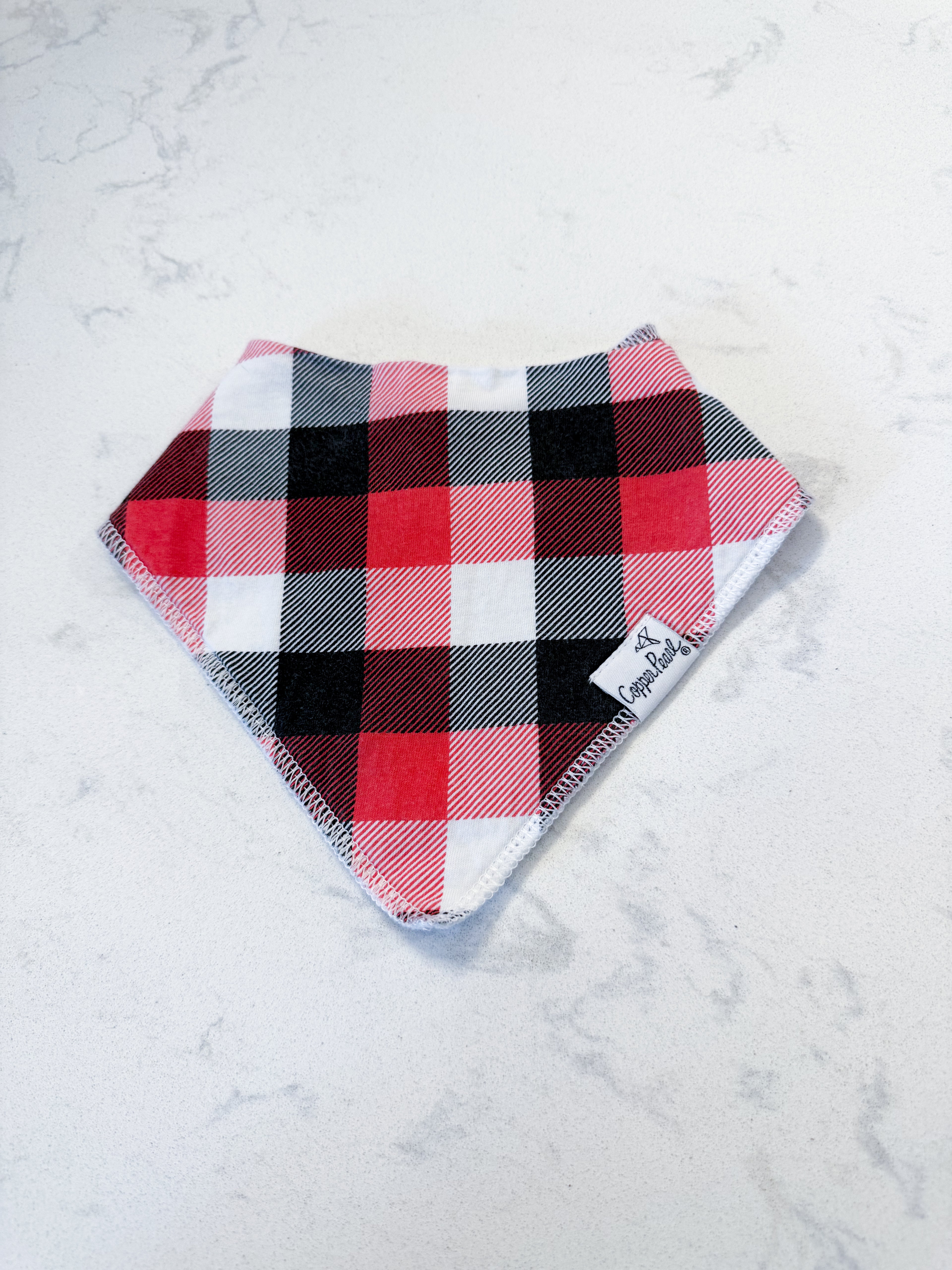 Copper Pearl- VGUC- drool bib- red white and black plaid