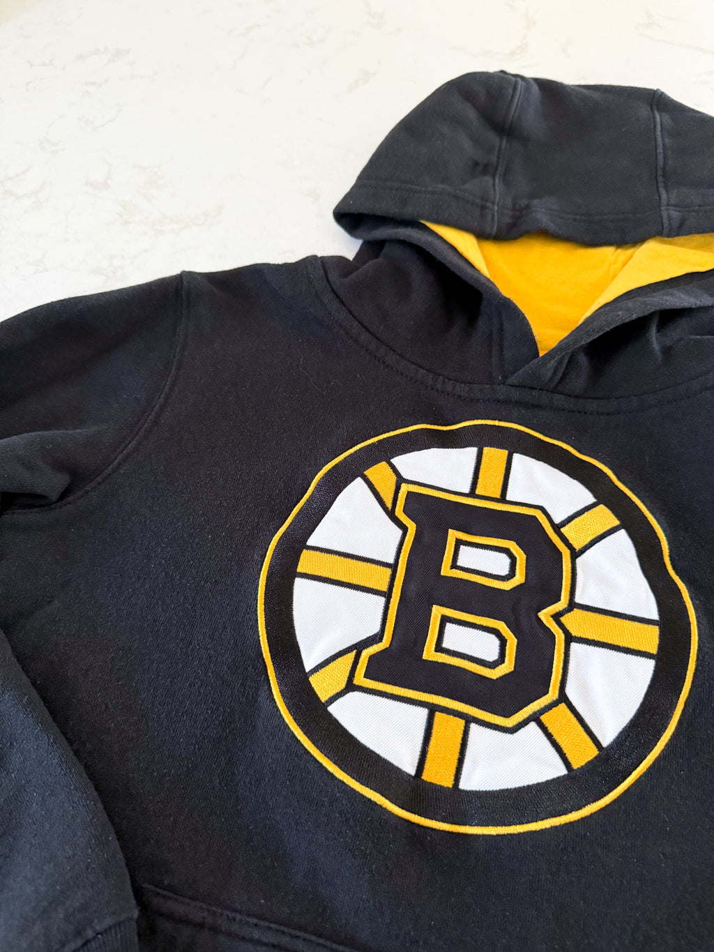 NHL- 10-12Y- GUC- black Boston Bruins hoodie embroidered logo