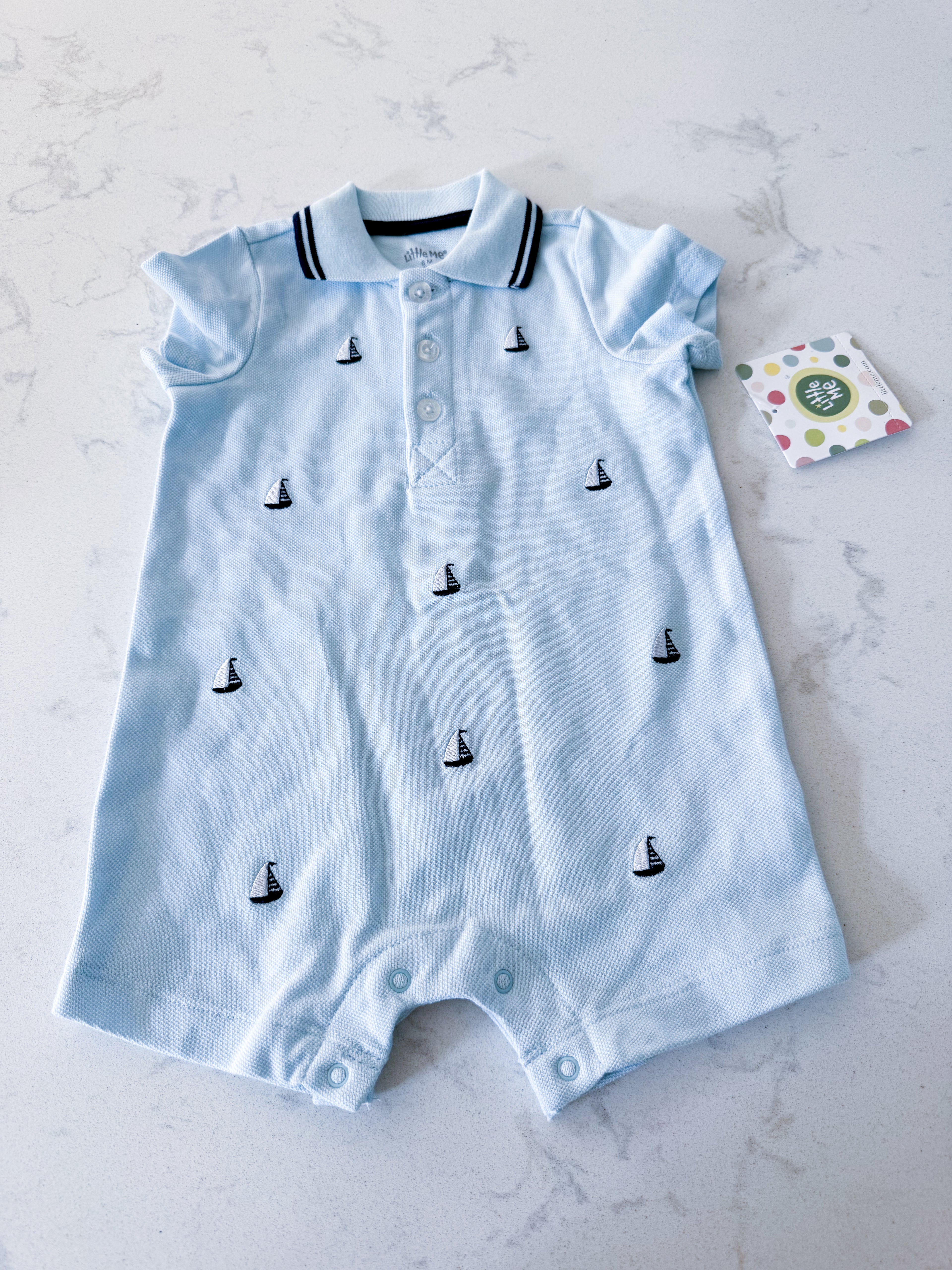 Little Me- fits 6-12m- BNWT- light blue polo romper with embroidered sailboats
