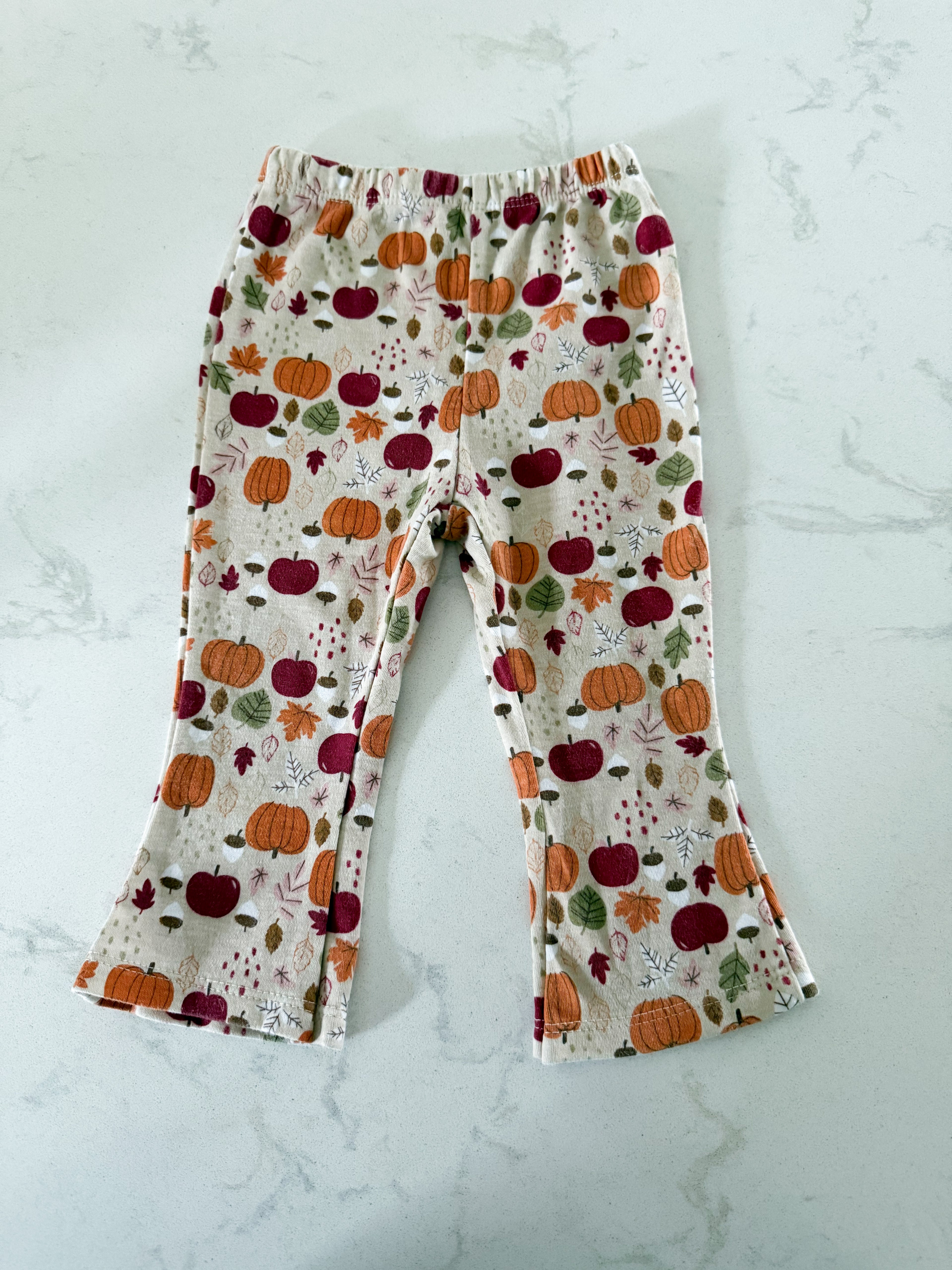 Chick Pea- 12m- GUC- cream coloured flare leggings with fall pattern