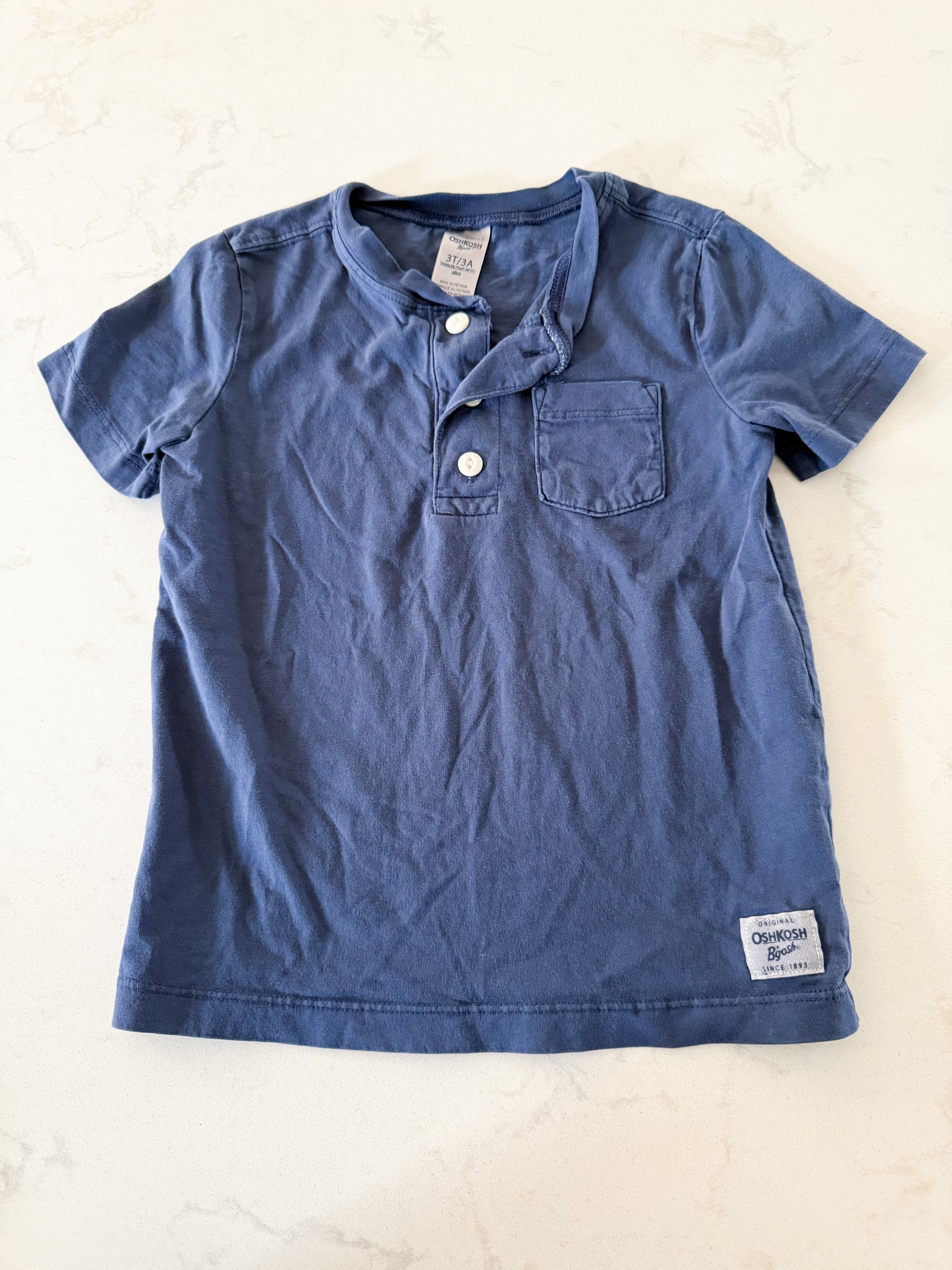 Oshkosh- 3T- GUC- medium blue t shirt with pocket