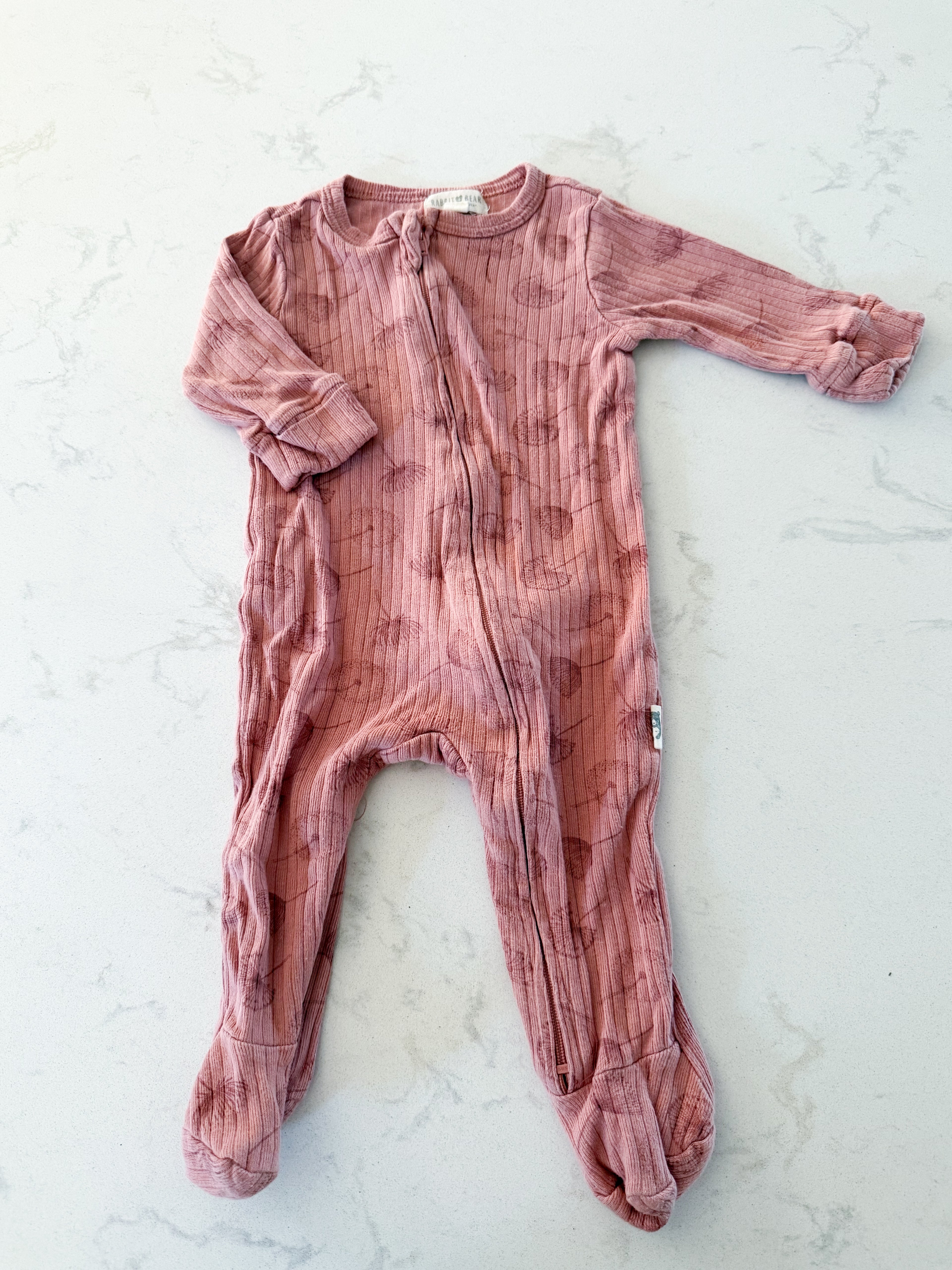 Rabbit and Bear-3-6m- GUC- dusty dark pink ribbed footie jammies with dandelion flowers on it
