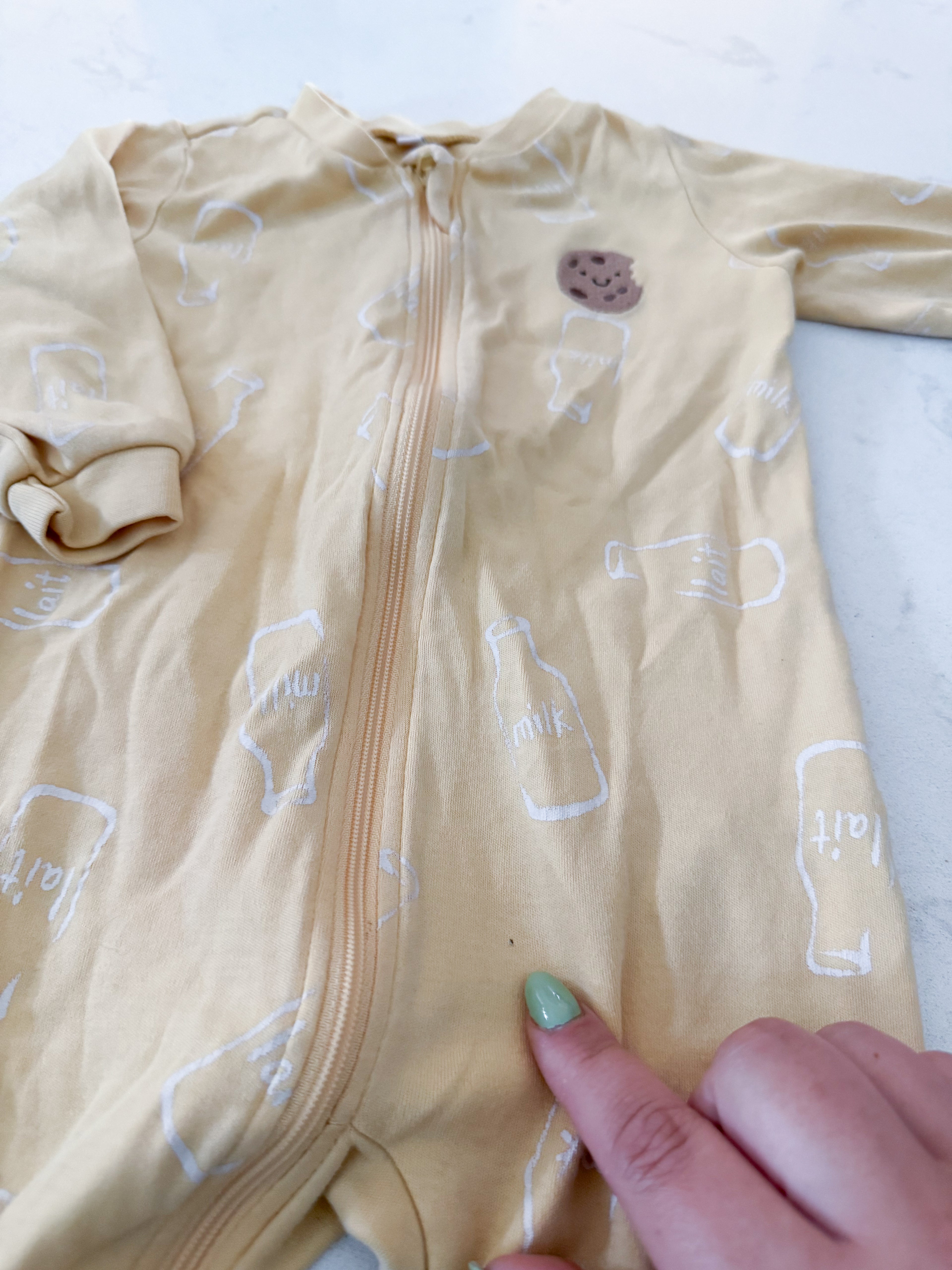 Pekkle- 9m- Play- yellow footie Jammies with embroidered cookie