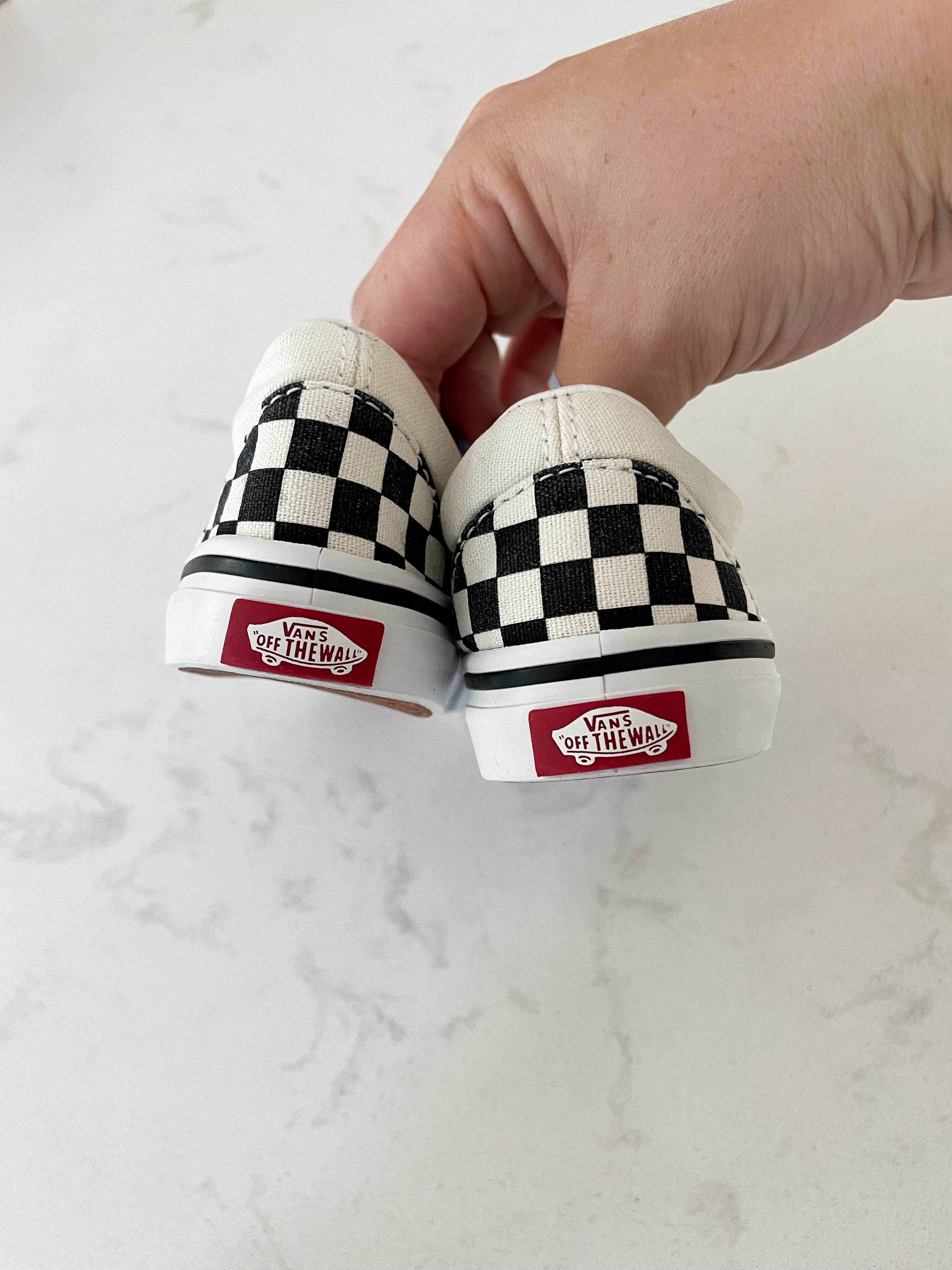 Vans- 6C- slip on black and white checkered shoes