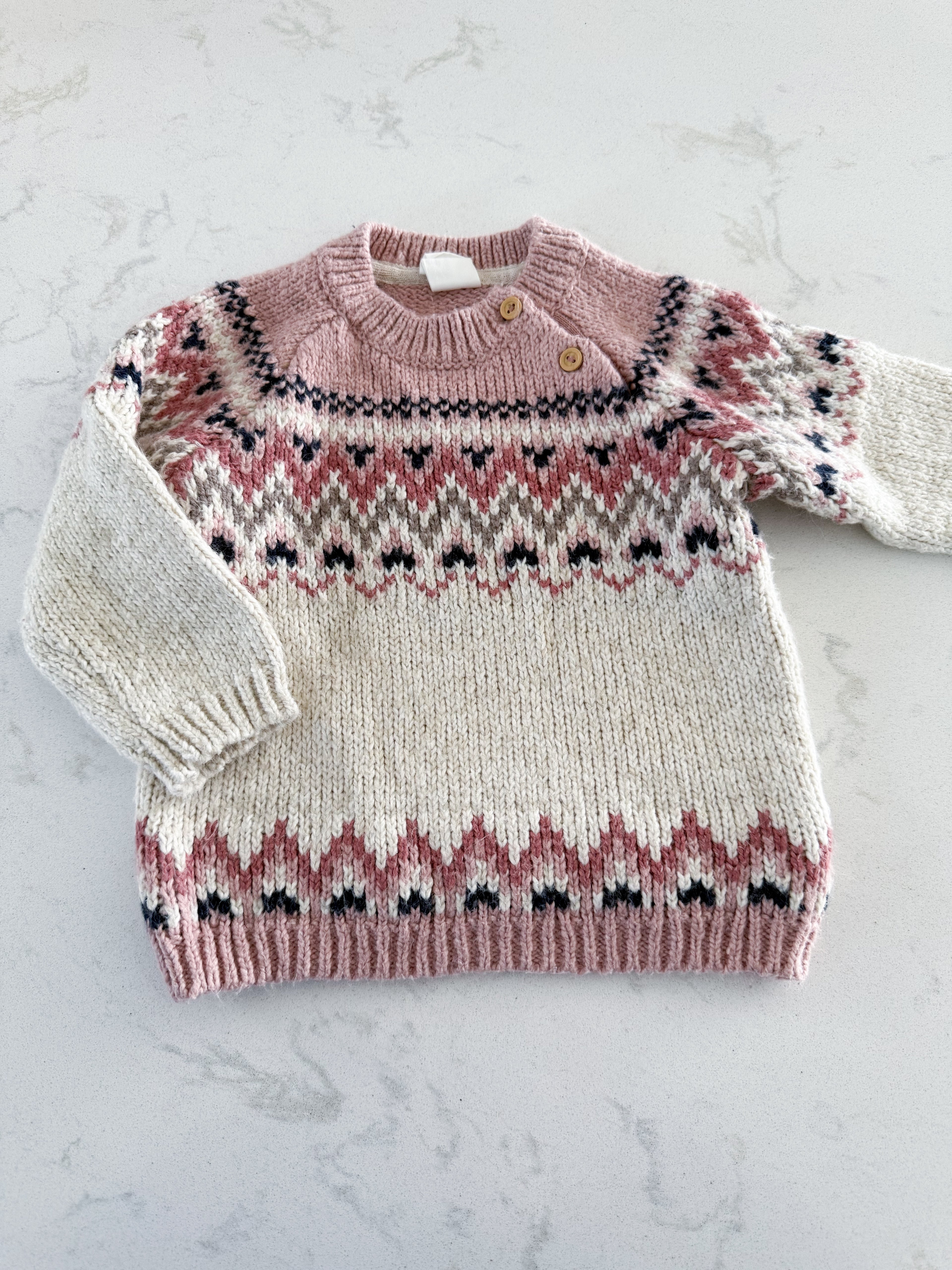 H&M- fits 6-12m- GUC- pink and white knit sweater