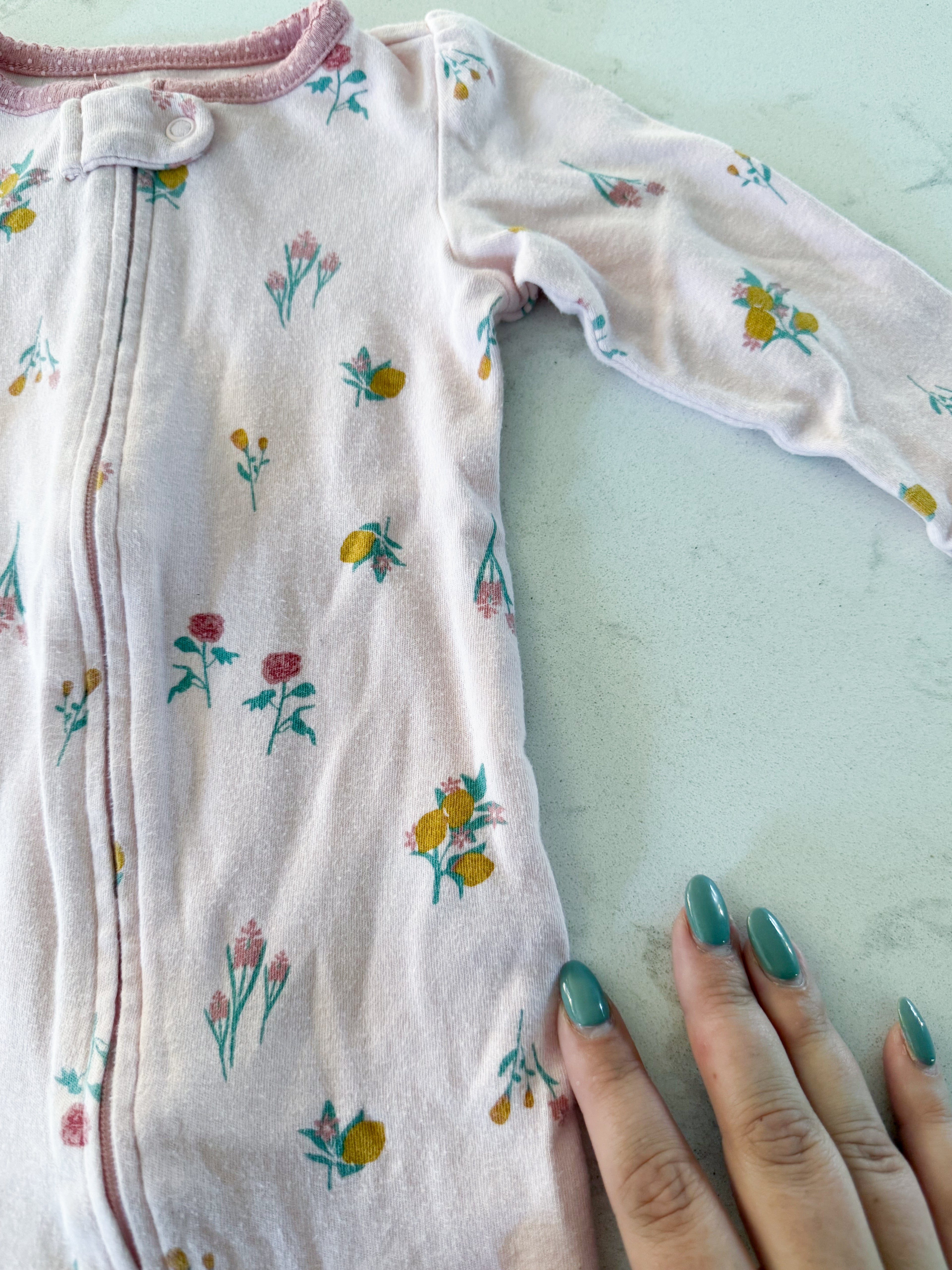 Carter’s- 6-9m- GUC- pink footie pajamas with small florals