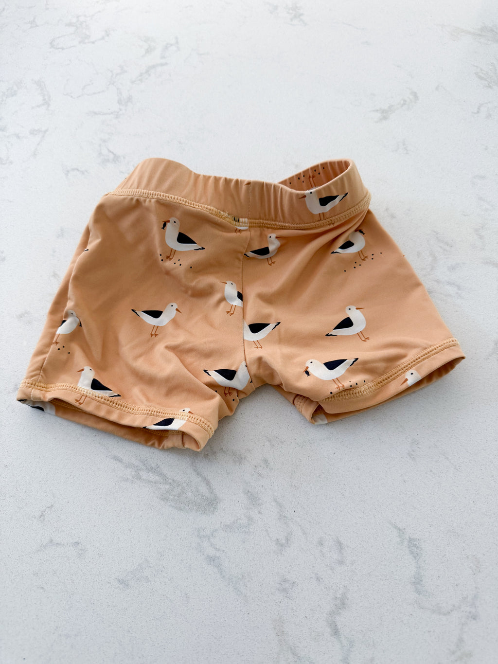 First by Petit Lem- 18-24m (fits tight)- VGUC- Sandy orange swim shorts with seagulls