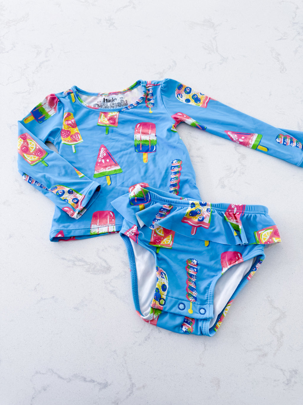 Hatley- 9-12m- VGUC- bright blue two piece swim suit with long sleeve top and bottoms