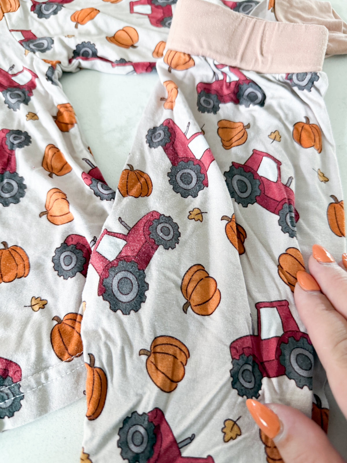 Little Beau Co- 18-24m- GUC- bamboo Jammies with tractor and pumpkin pattern