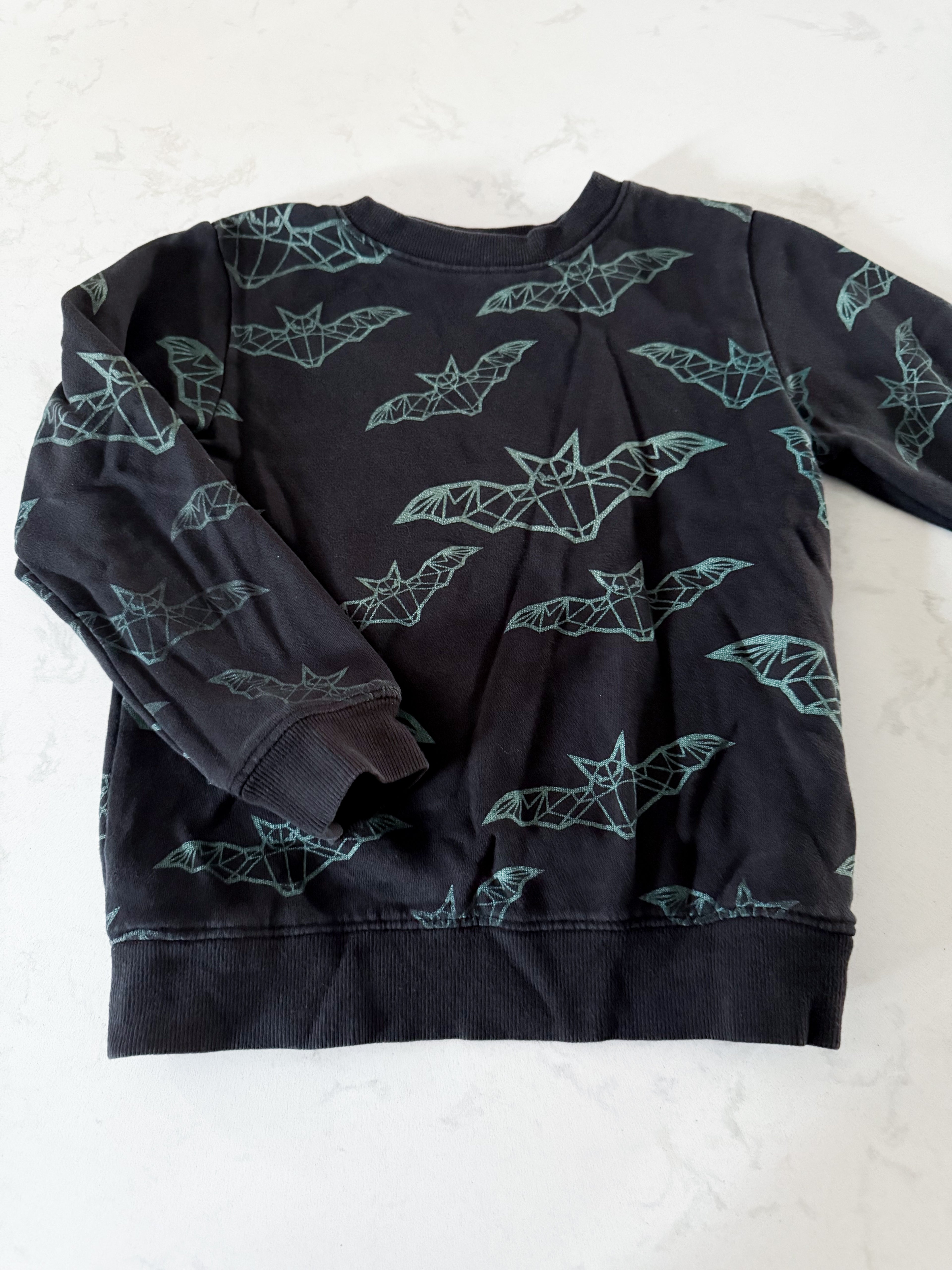 H&M- 6X/7- GUC- black crewneck with green geometric bats