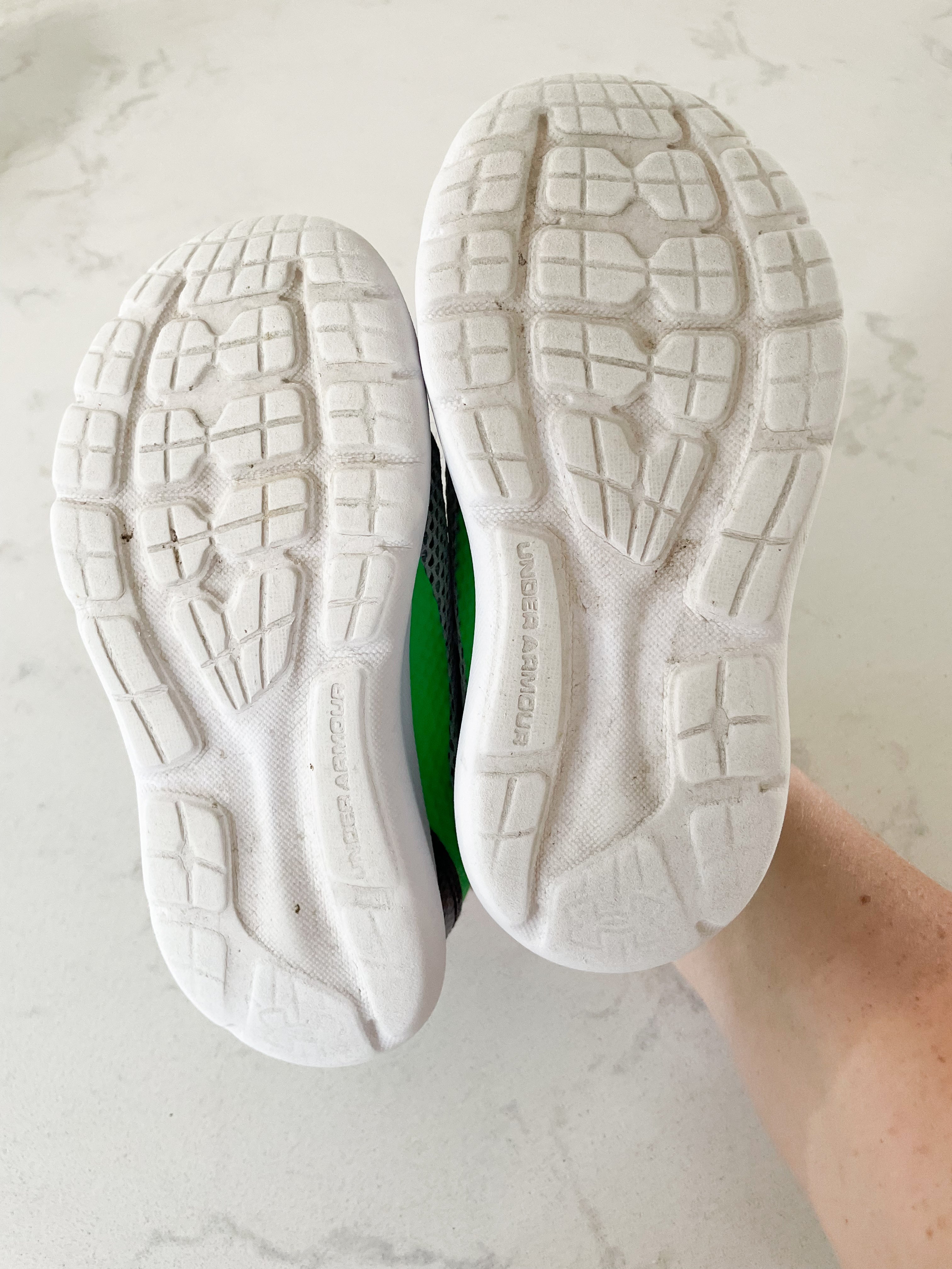 Under Armour- 9C- grey shoes with green and black
