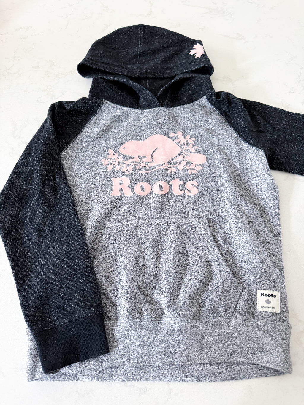 Roots- 11-12Y- VGUC- Grey and black speckled hoodie with pink logo