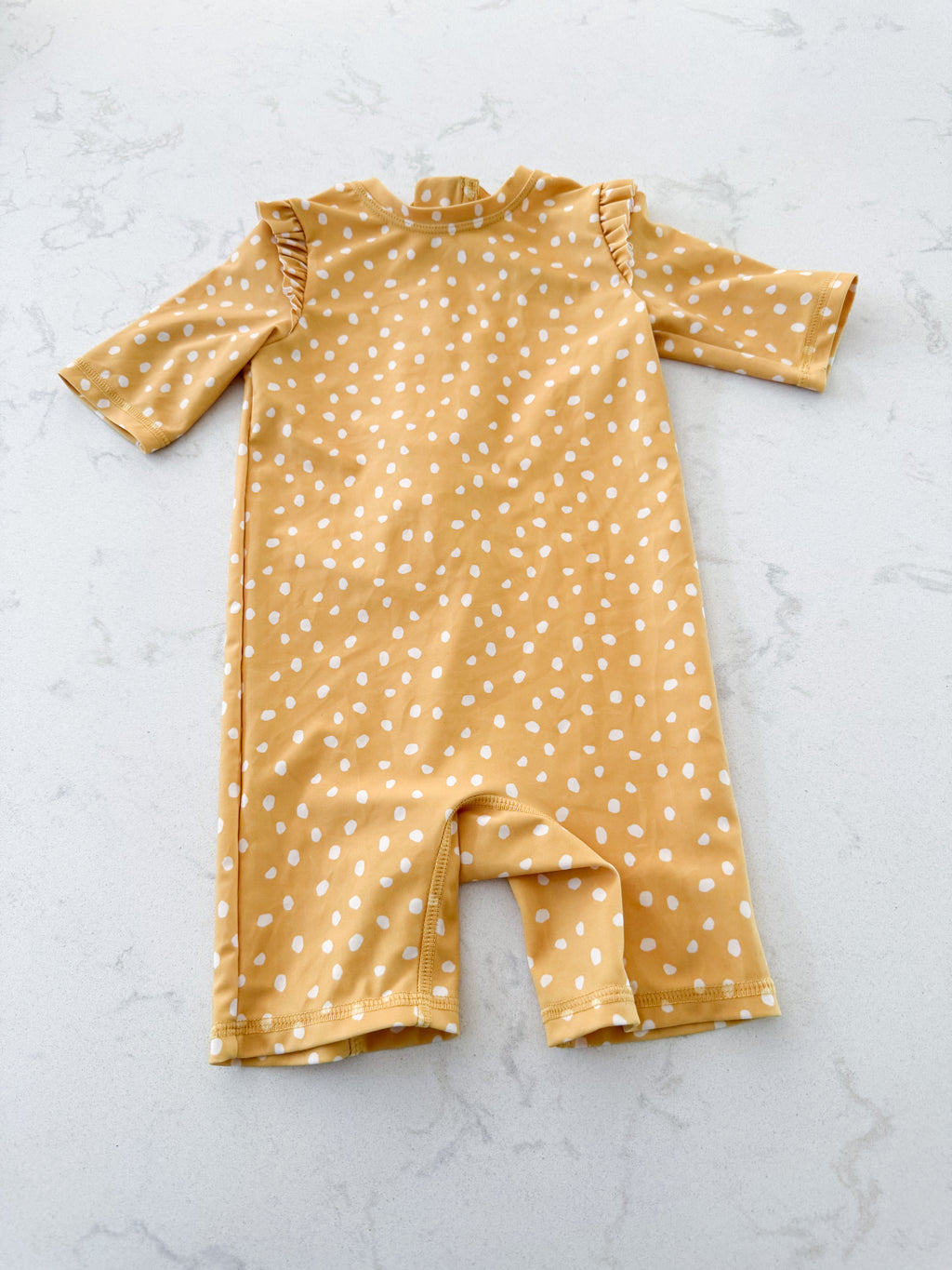 H&M- 9-12m- VGUC- mustard yellow swimsuit with white polka dots and ruffles