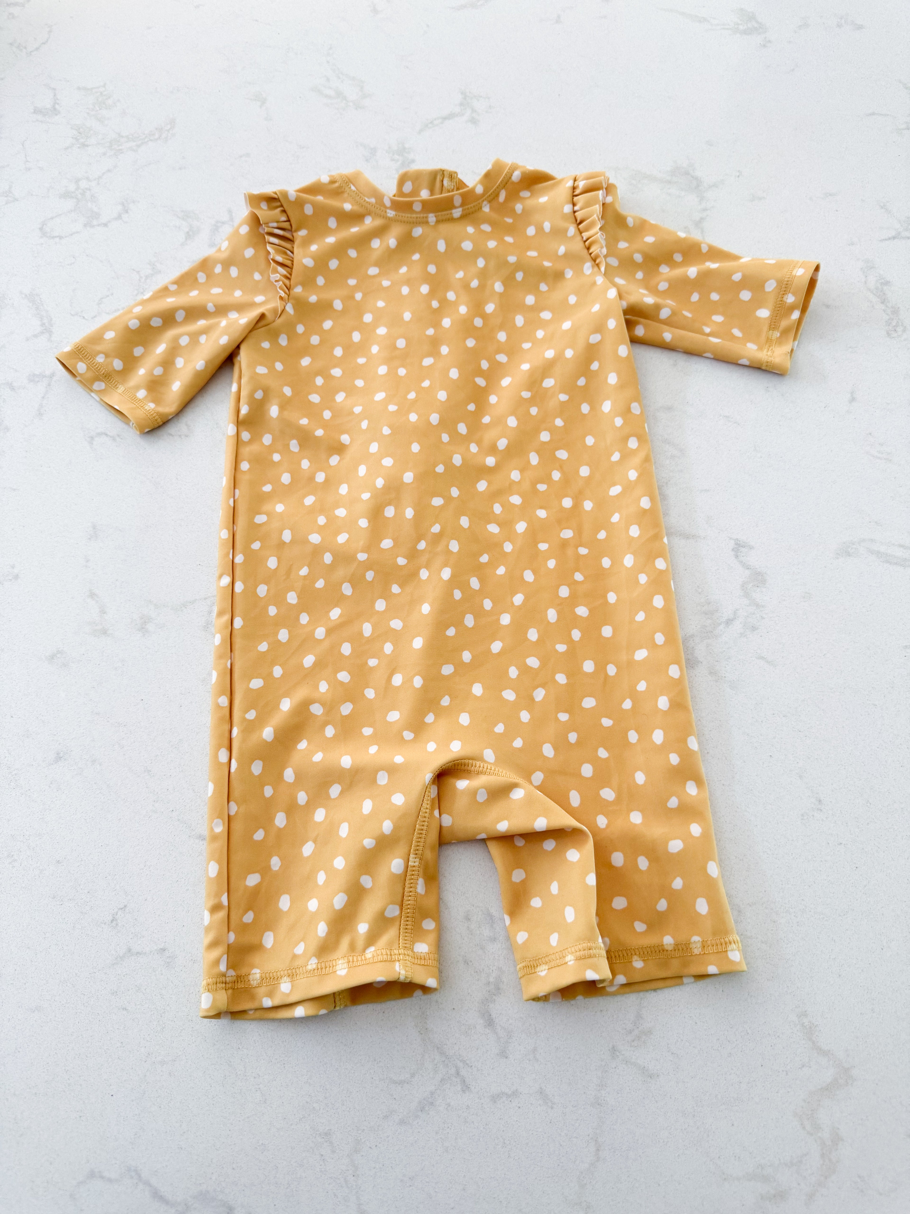 H&M- 9-12m- VGUC- mustard yellow swimsuit with white polka dots and ruffles