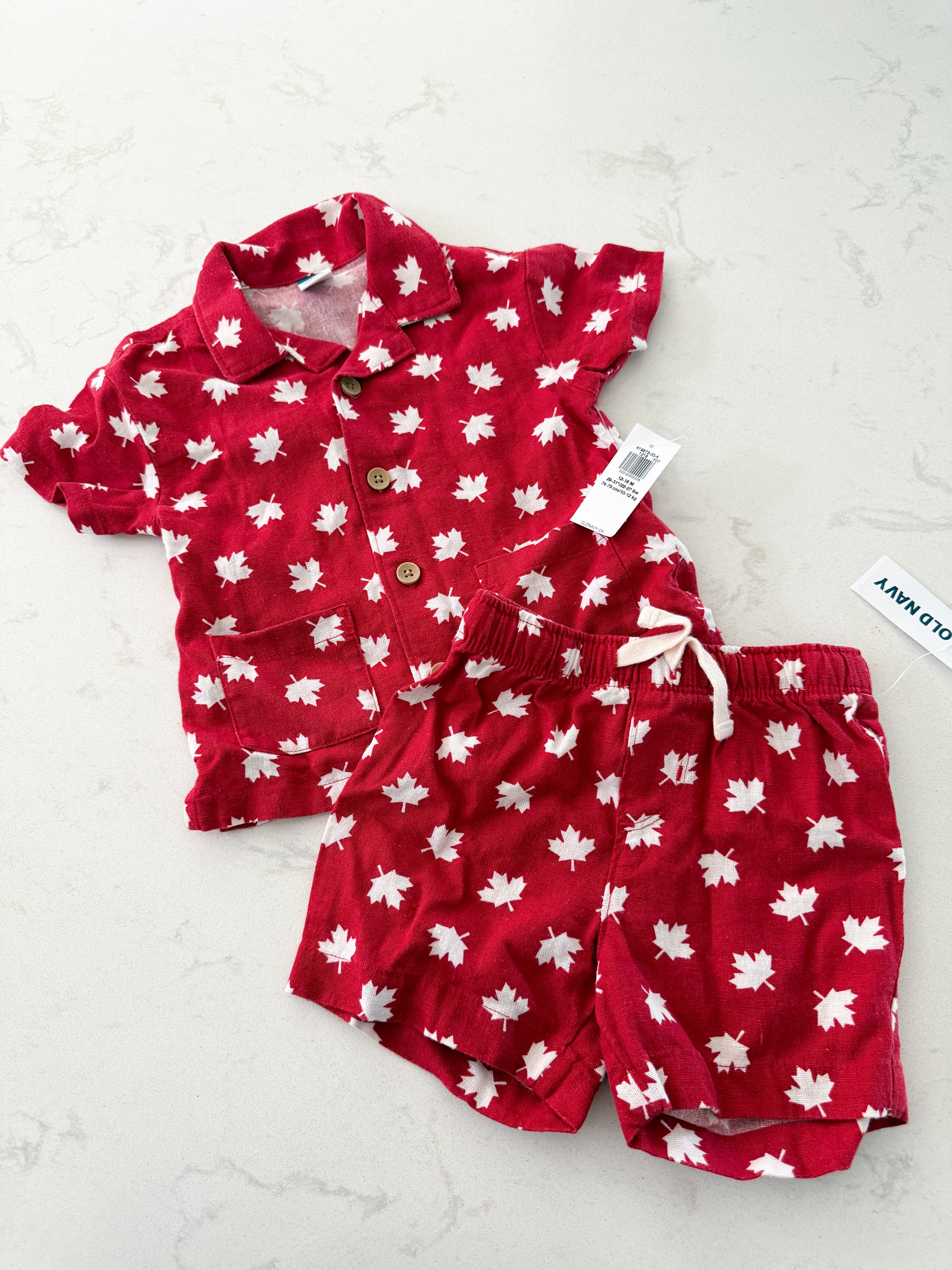 Old Navy- 12-18m- BNWT- red matching sets with white Canadian leaf pattern