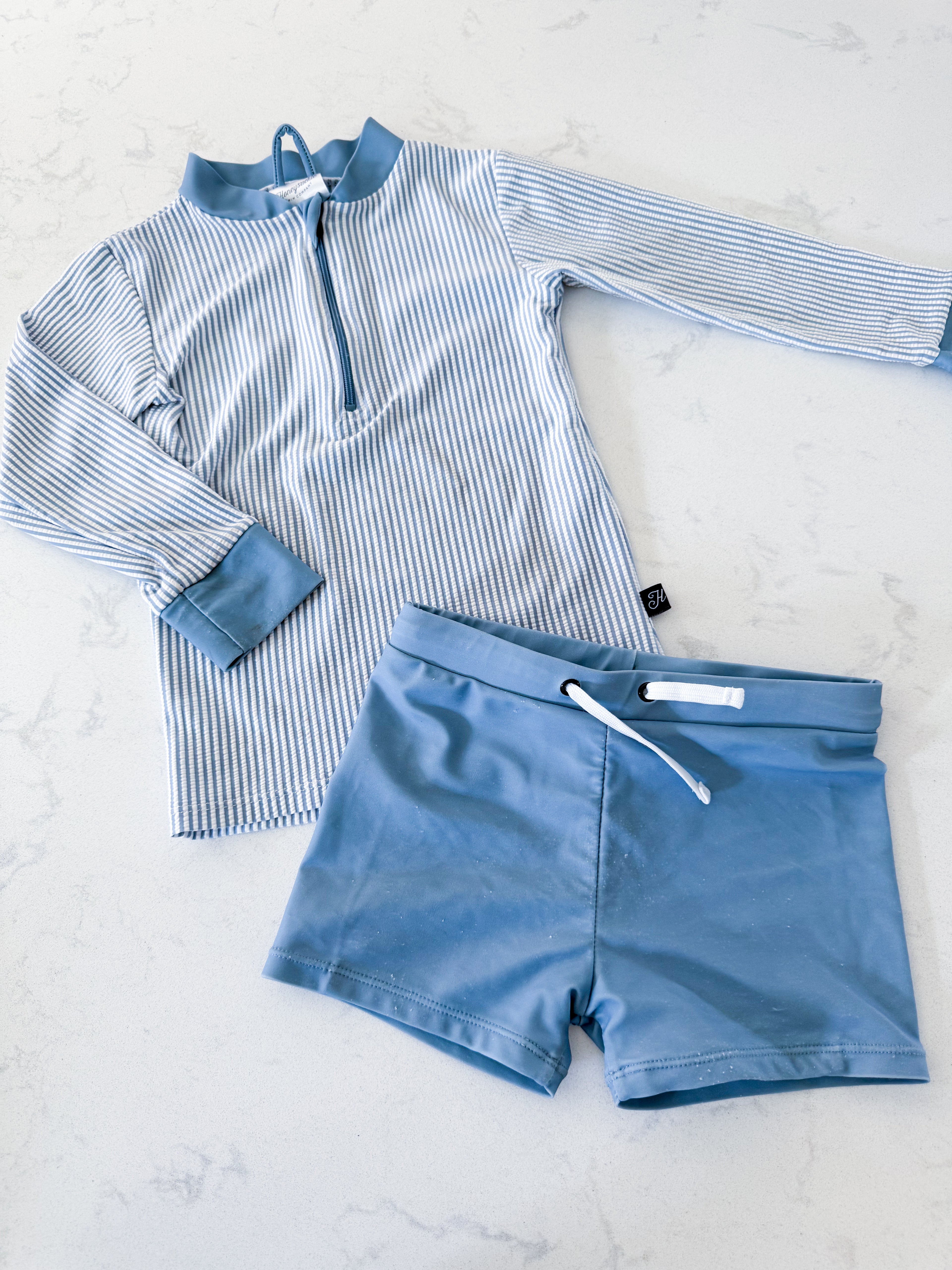 Honeysuckle Swim Company- 4/5Y- PLAY- dusty blue and white striped rashguard with matching blue shorts
