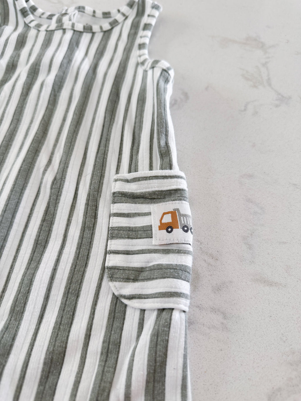 George- 6-12m- GUC- sage green and white striped ribbed tank romper